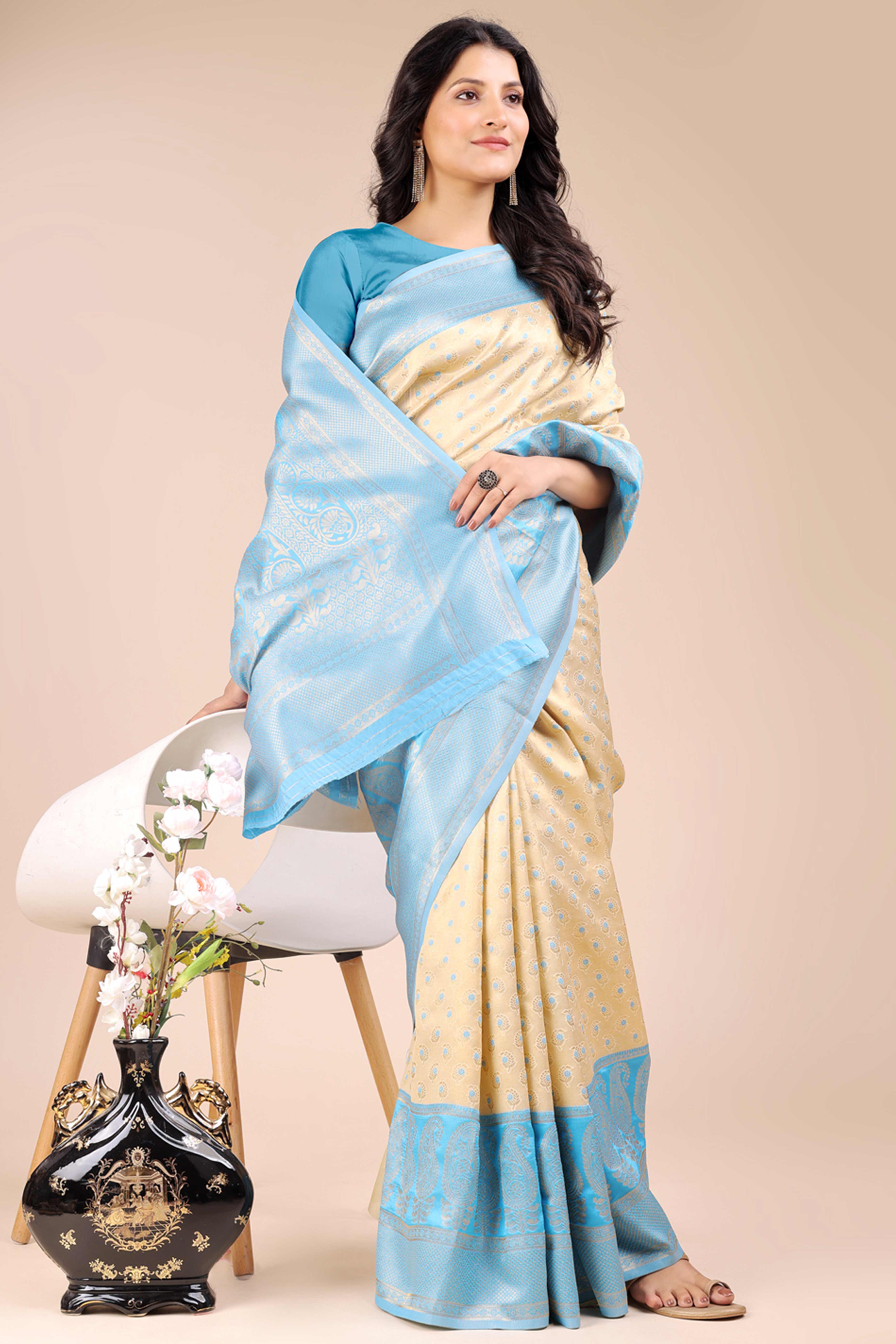 Cream Banarasi Silk Saree Featuring Lustrous Sky Blue Floral Zari Weaving and a Rich Contrast Border