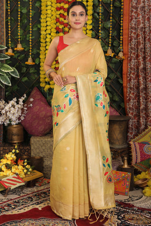 Light Yellow Linen Cotton Saree Showcasing Floral & Peacock Zari Woven Design
