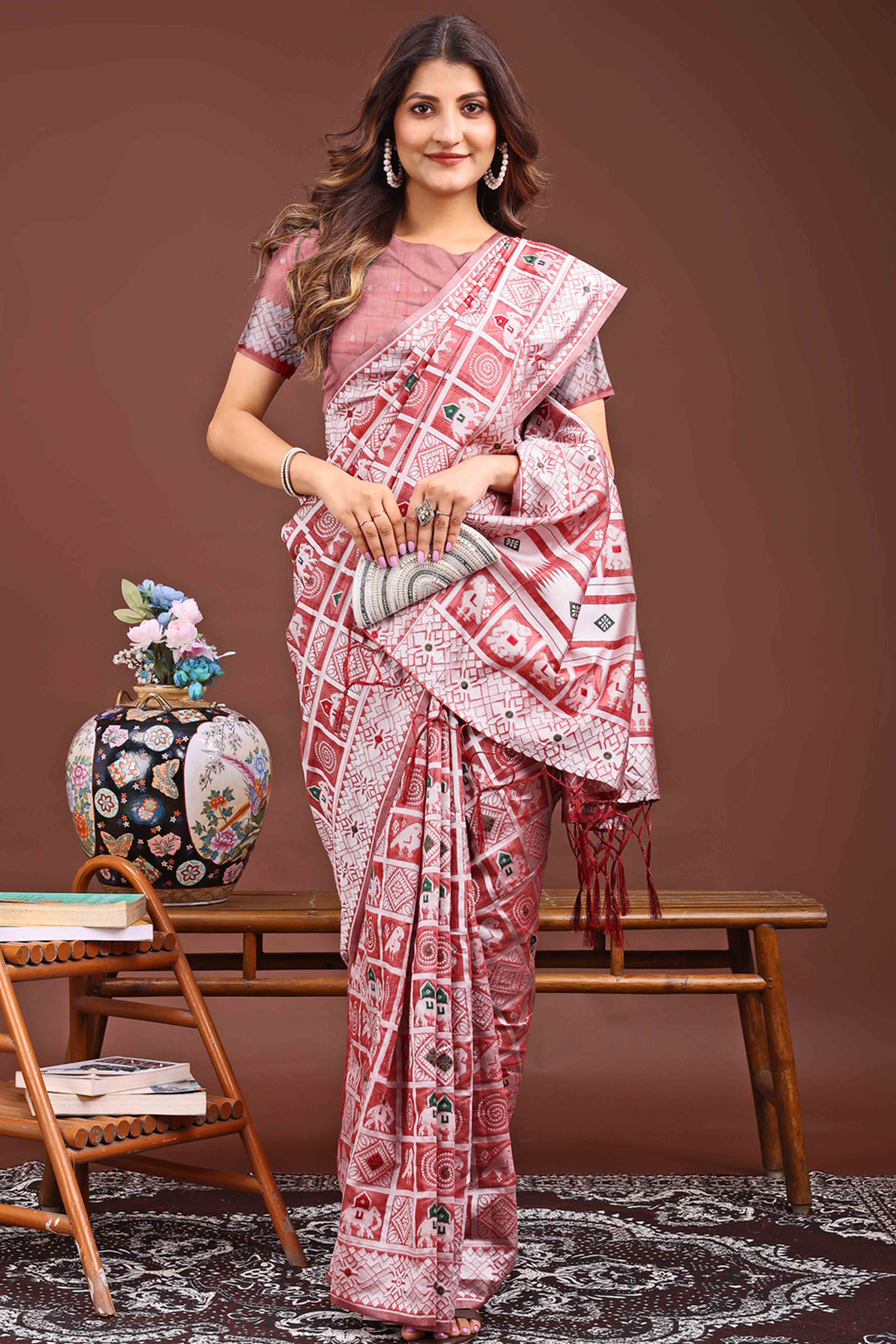 Peach Linen Cotton Saree Adorned With Zari Weaving & Tassel pallu