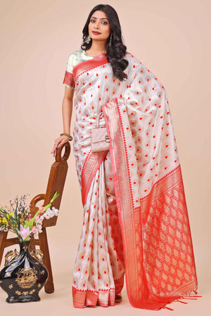White Banarasi Silk Saree With Intricate Floral Weave & Elegant Tassel Accents
