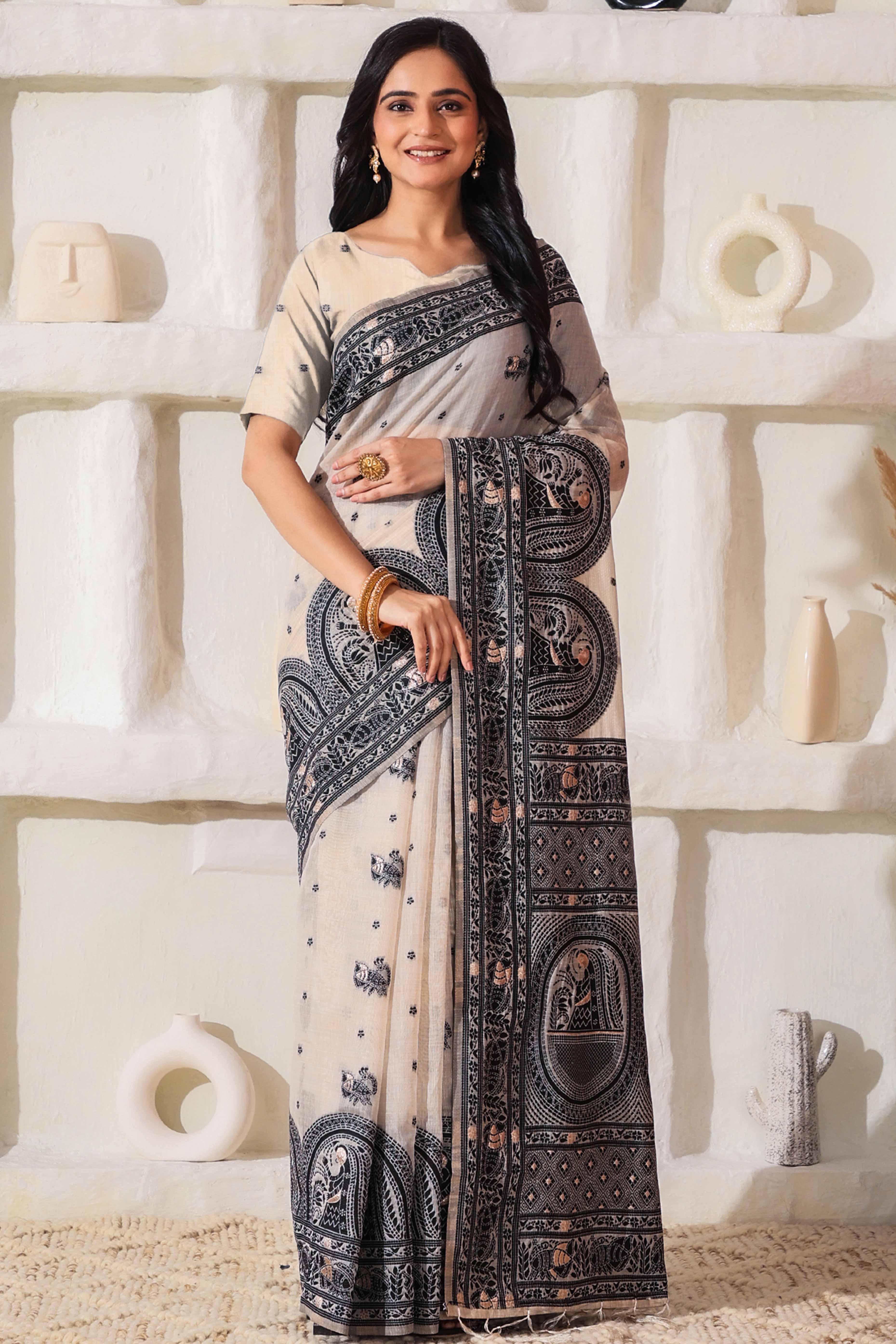 Weaving Cream & Black Linen Cotton Saree Adorned With Graceful Tassel Detailing