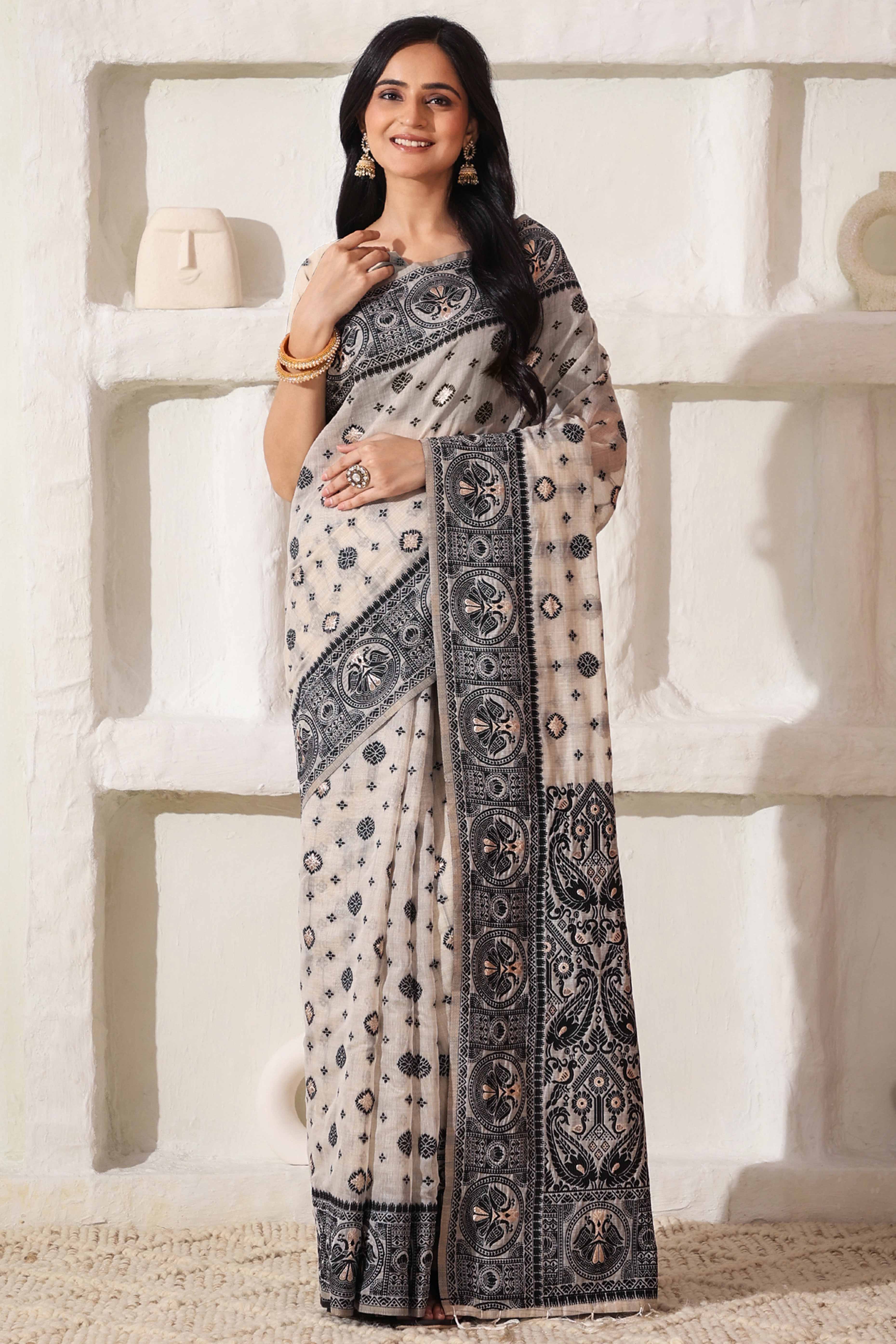 Cream & Black Saree In Linen Cotton With Traditional Zari Woven Detailing And Tassel Pallu