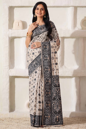 Cream & Black Saree In Linen Cotton With Traditional Zari Woven Detailing And Tassel Pallu
