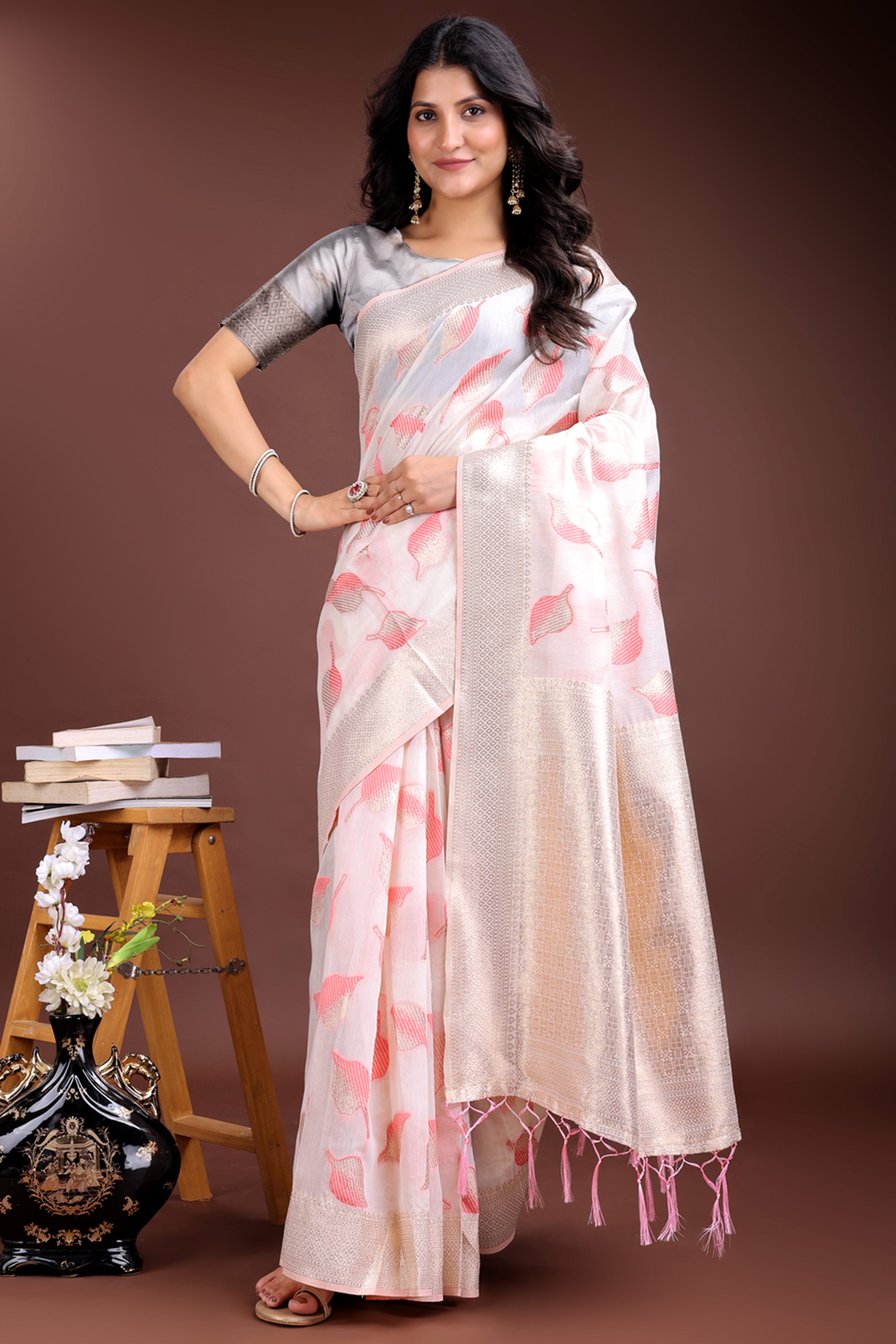 White and Pink Cotton Silk Saree with Leaf Motifs and Zari Border Tassel Design
