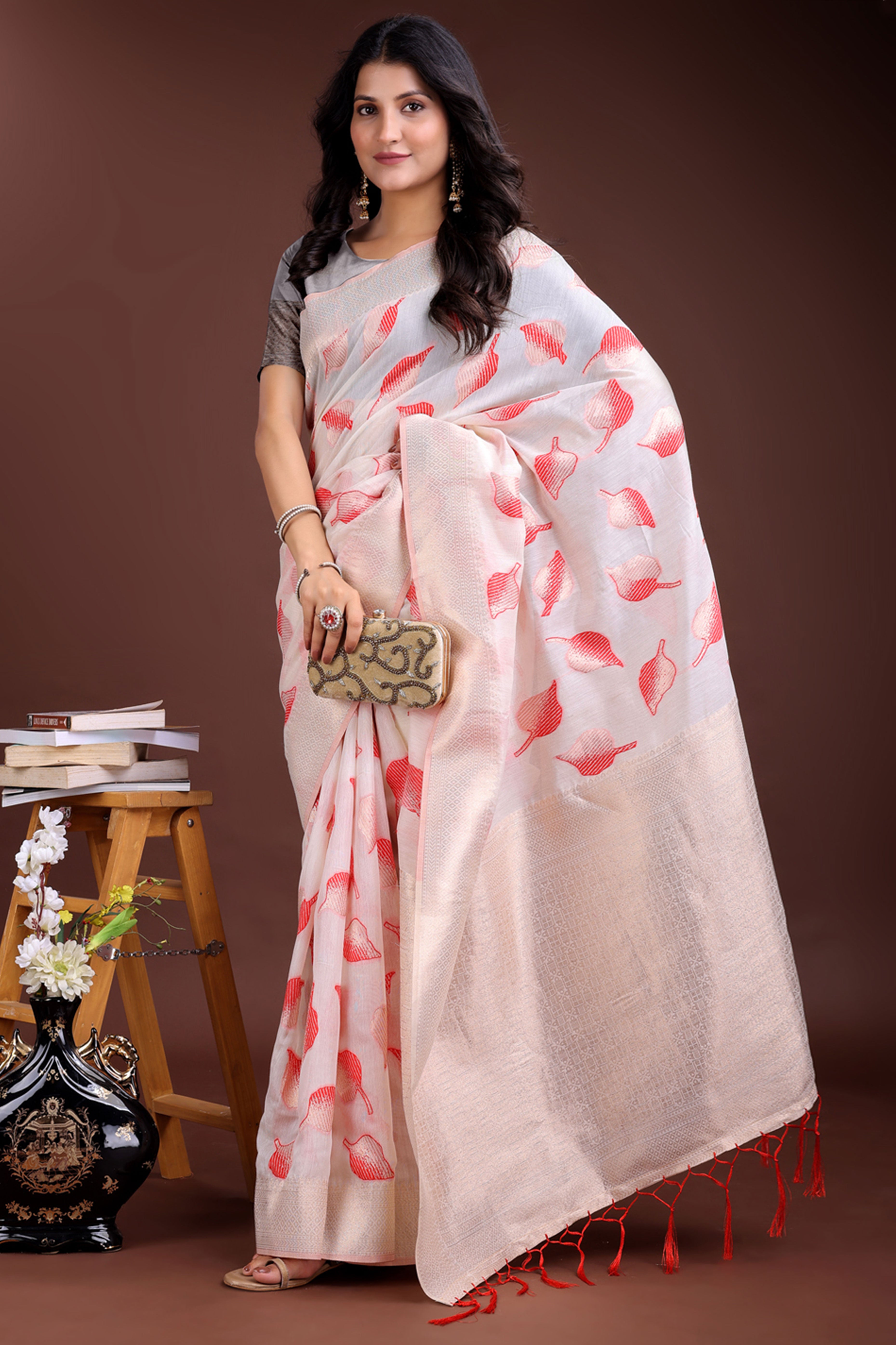 White and Red Cotton Silk Saree with Leaf Motifs and Zari Border Tassel Artistry