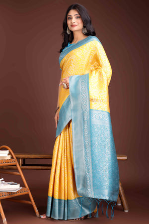 Yellow Floral Zari Weaving Lichi Cotton Silk Saree With Tassel Border