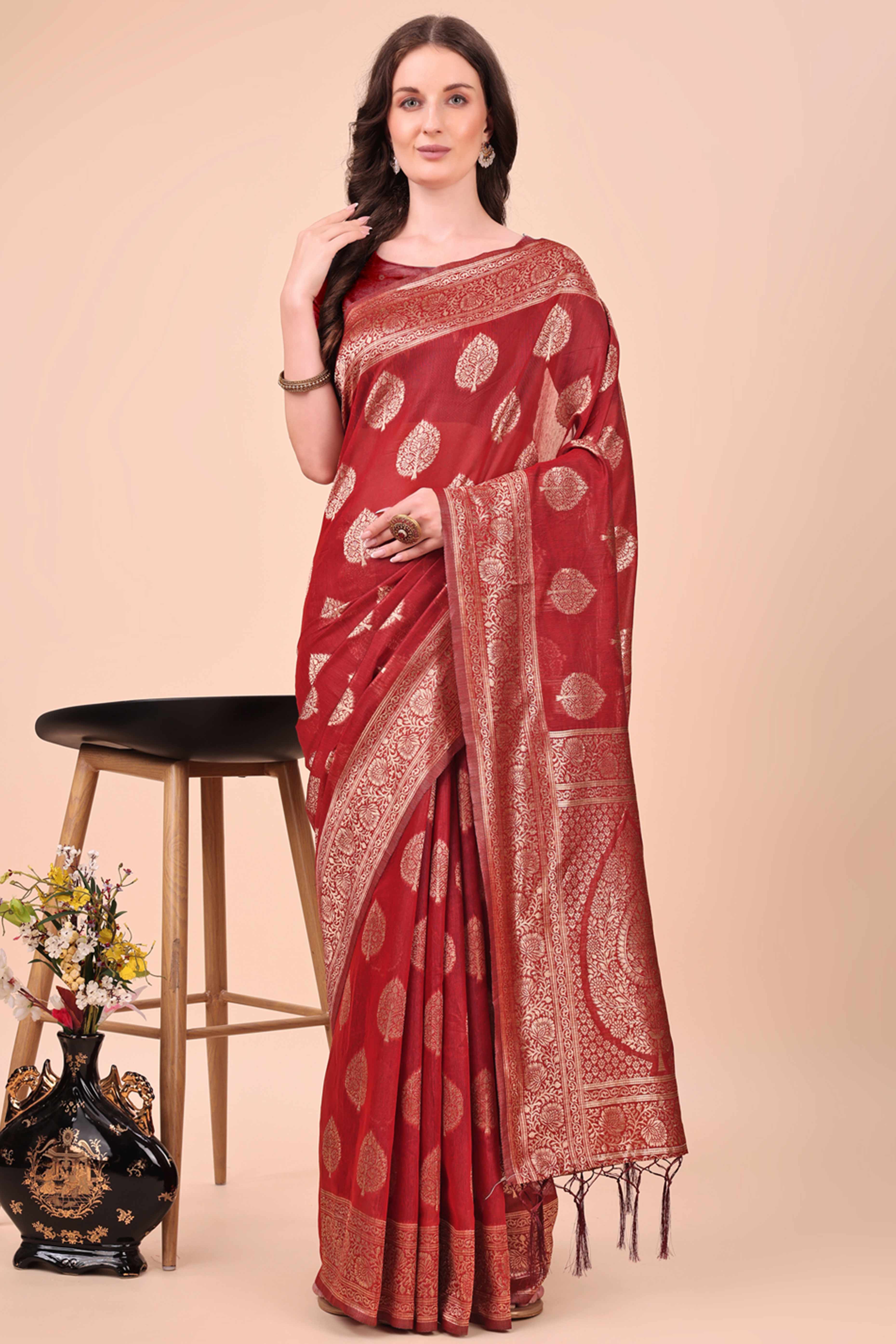 Maroon Cotton Blend Saree With Intricate Floral Zari Weaving & Elegant Tassel Accents