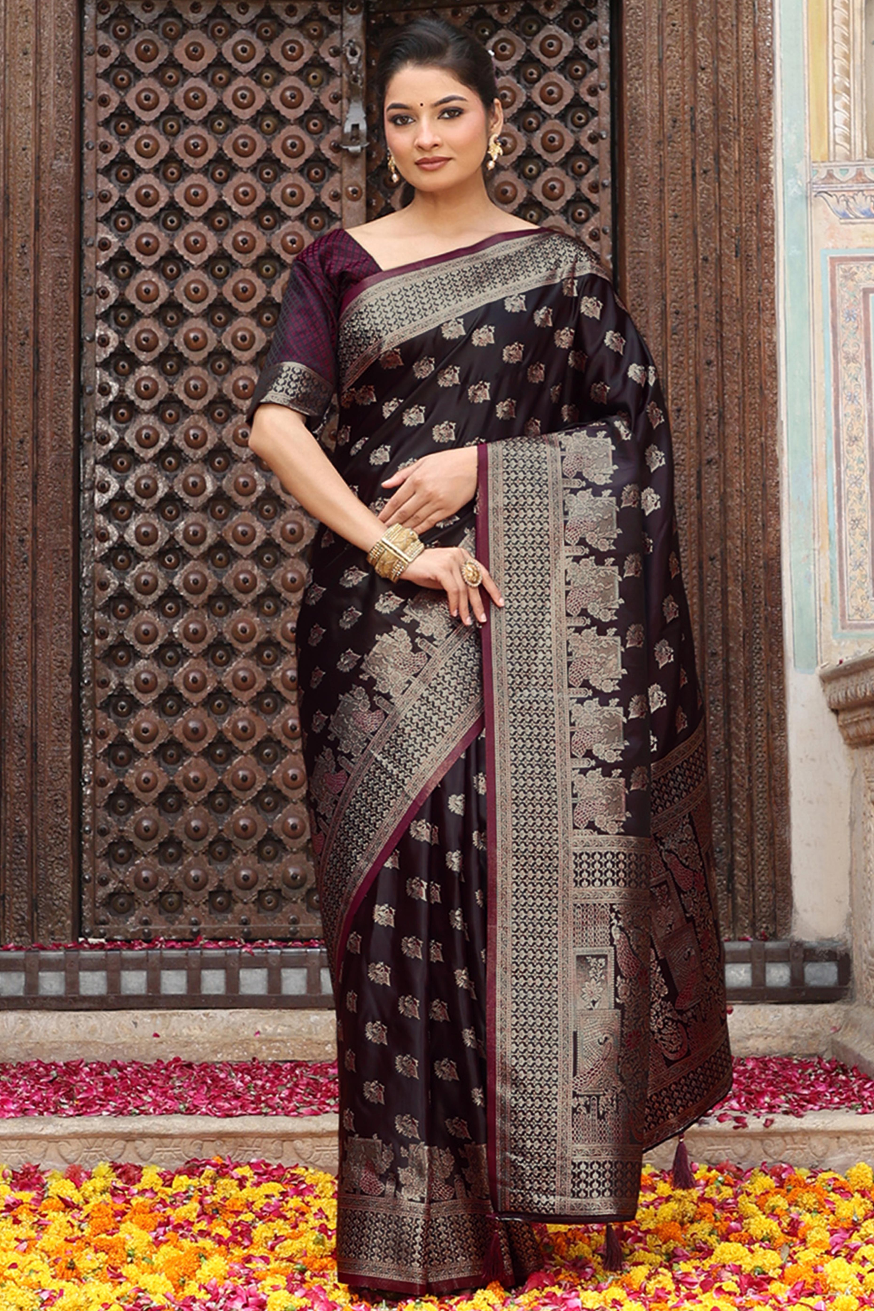 Designer Wine Saree Showcasing Peacock & Floral Zari Weaving With Handmade Tassel Pallu
