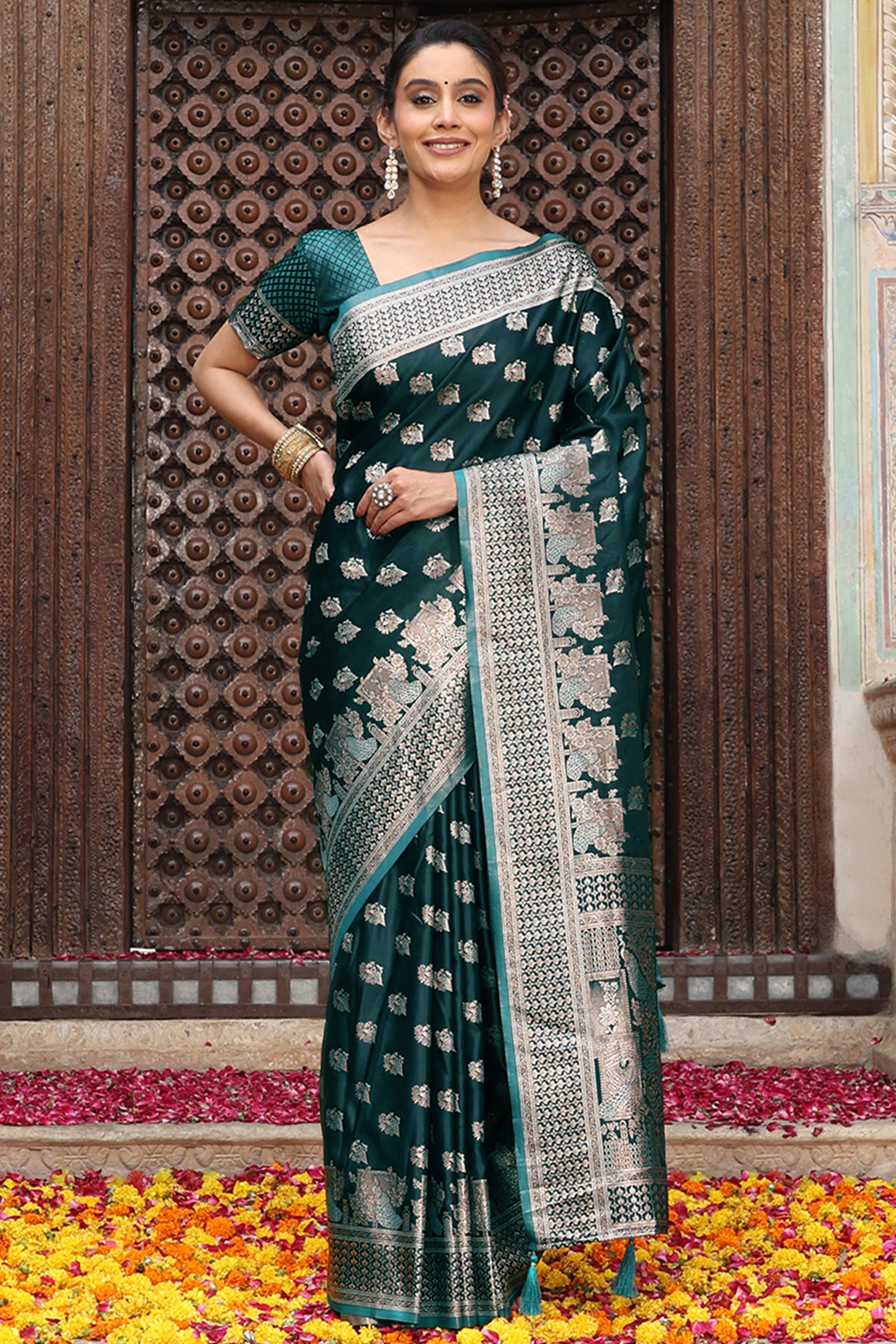Designer Dark Teal Saree Showcasing Peacock & Floral Zari Weaving With Handmade Tassel Pallu