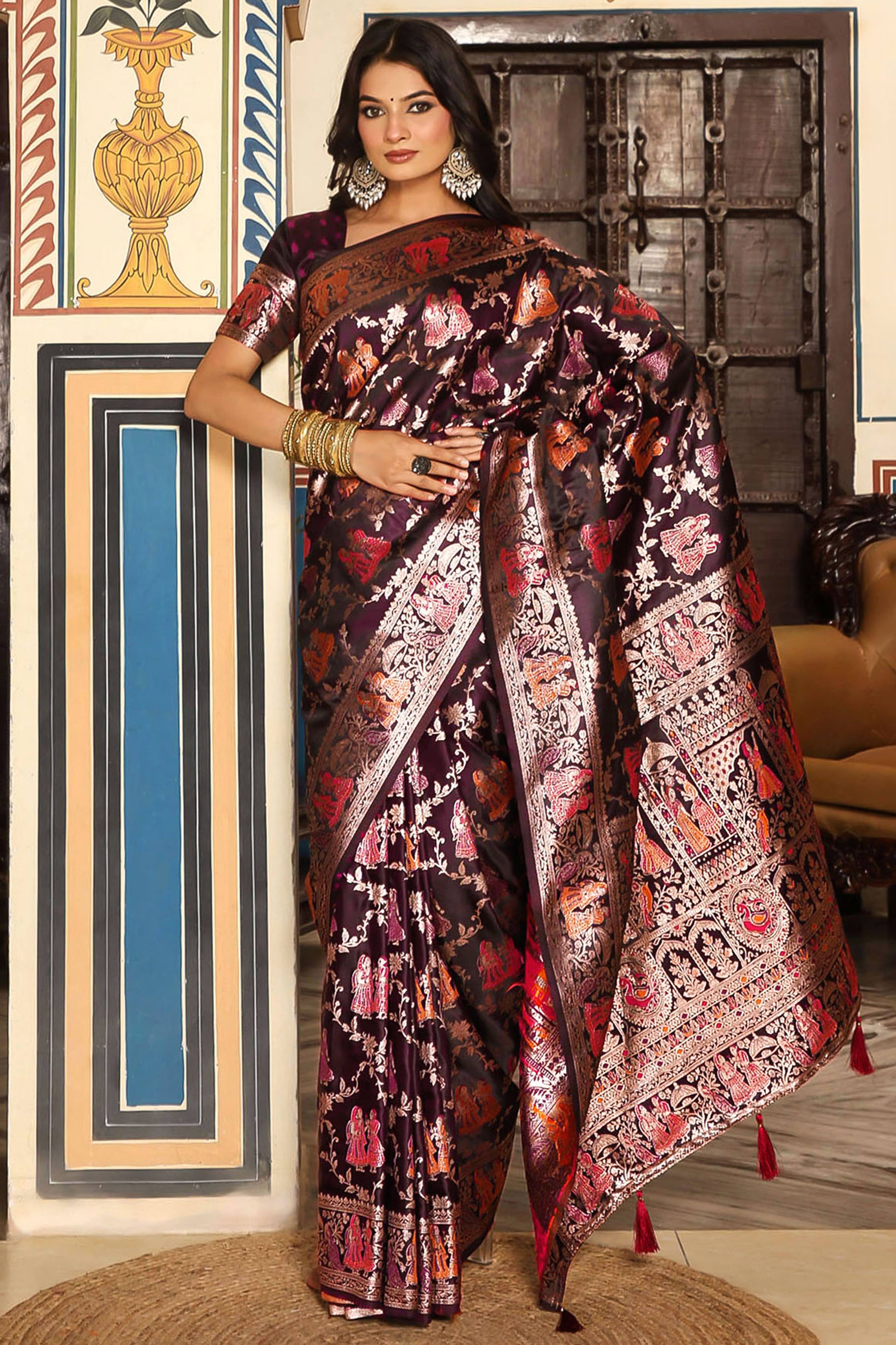 Luxurious Wine Silk Blend Saree With Intricate Floral Zari Weaving & Tassel Pallu