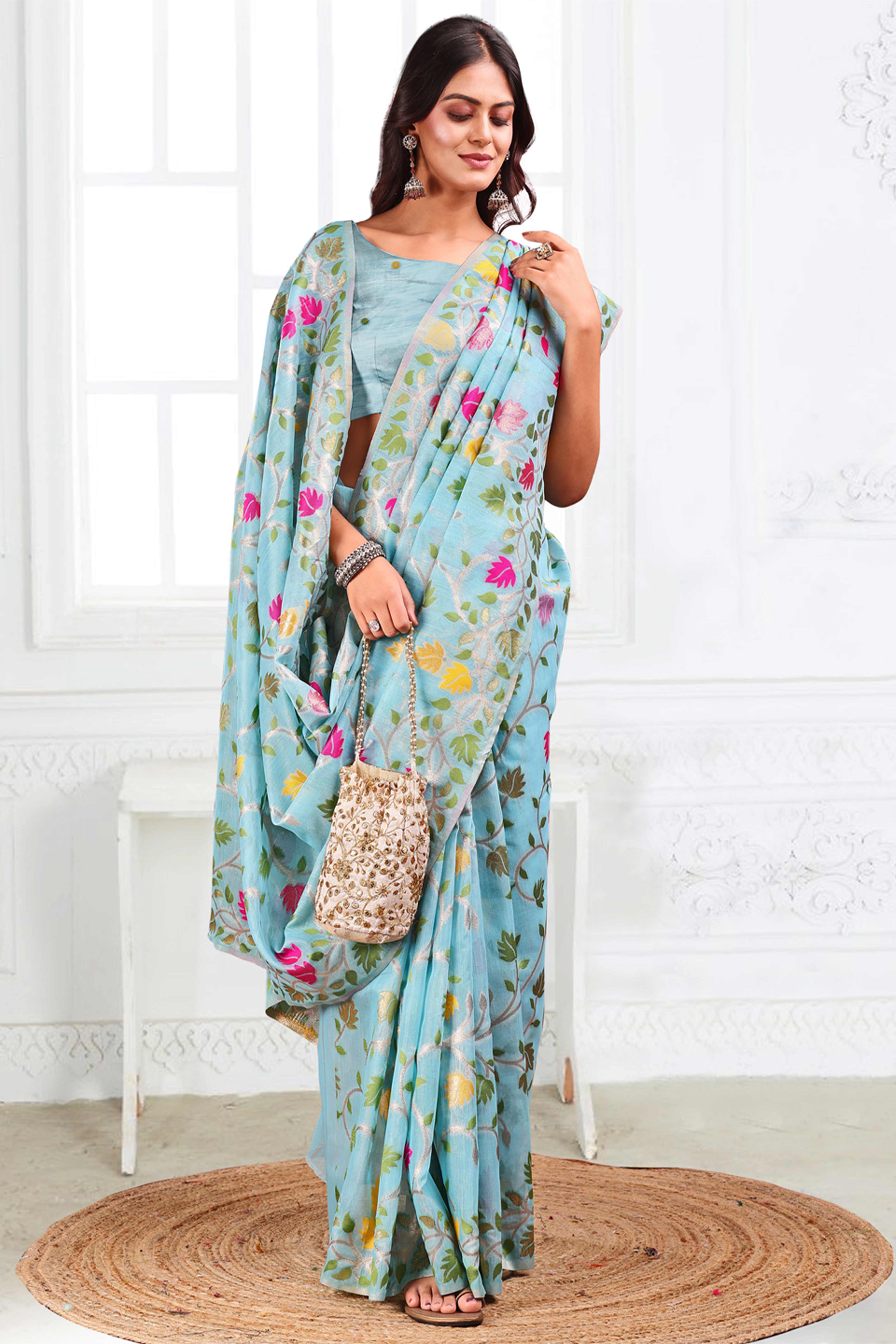 Sky Blue Linen Cotton Silk  Saree Enhanced With Floral Zari Weaving & Tasselled Pallu Finish