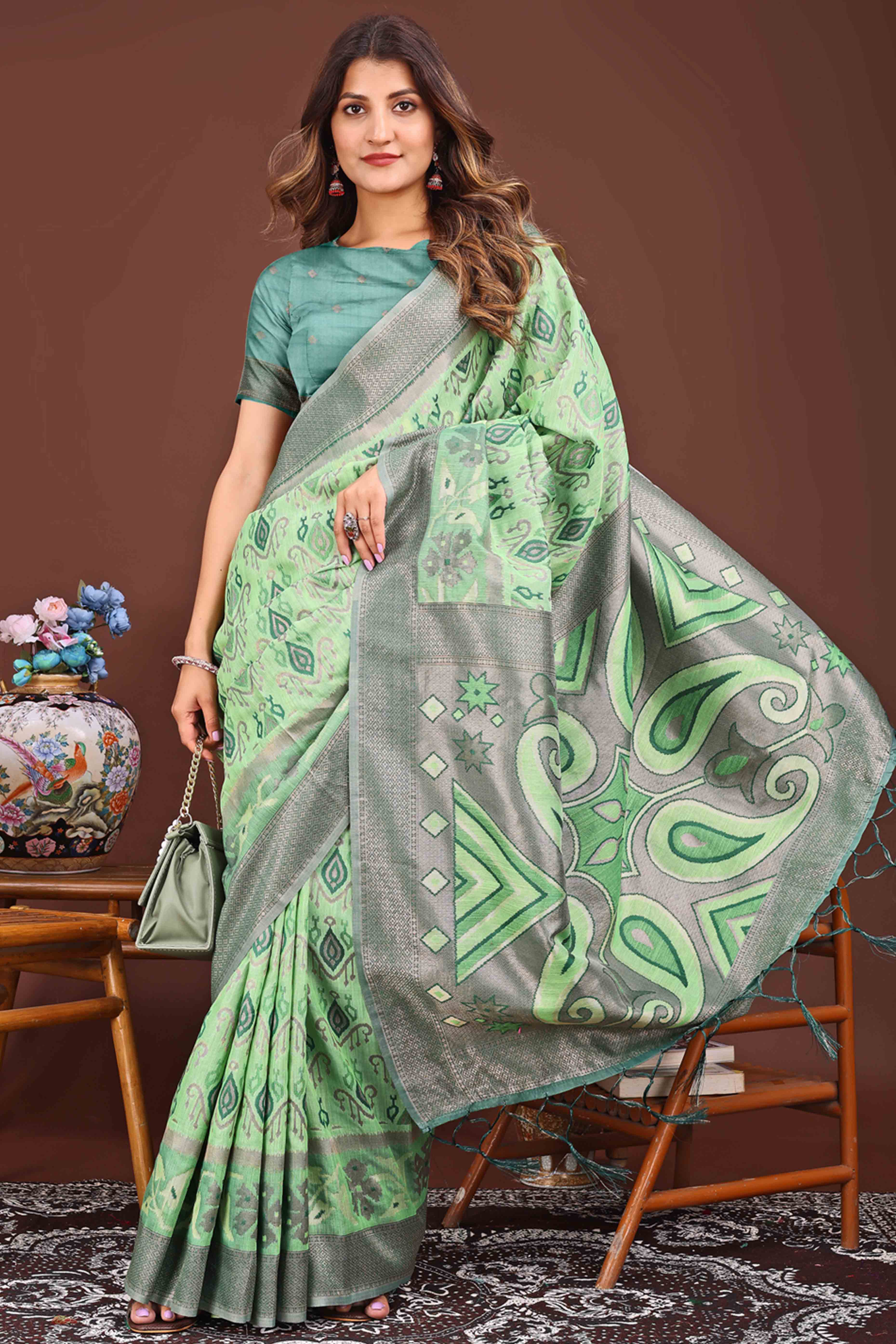 Sophisticated Zari Woven Green Linen Cotton Saree With Graceful Tassel Pallu