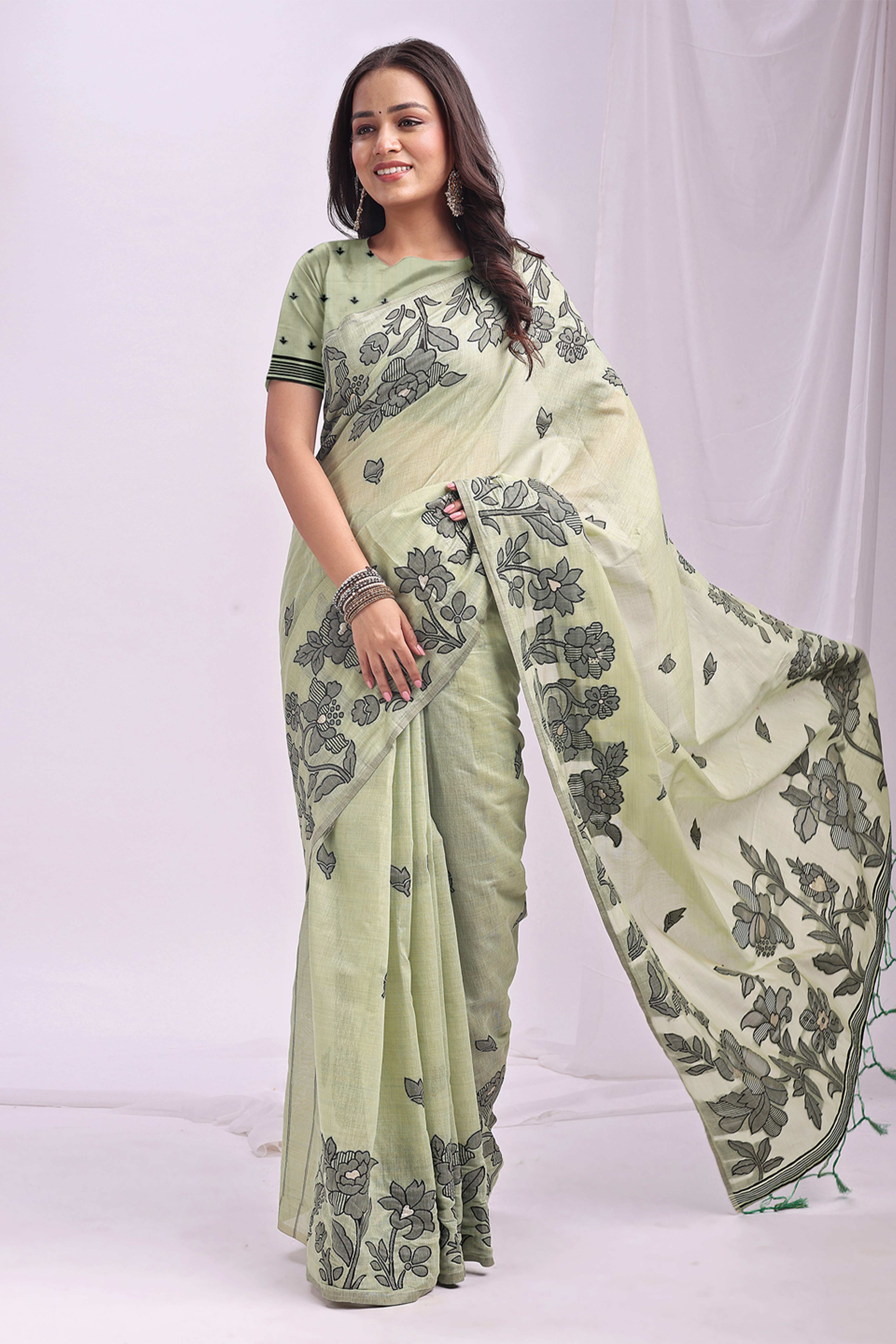 Light Green Ethnic Saree in a Linen Cotton Blend Adorned with Floral Weave Designs