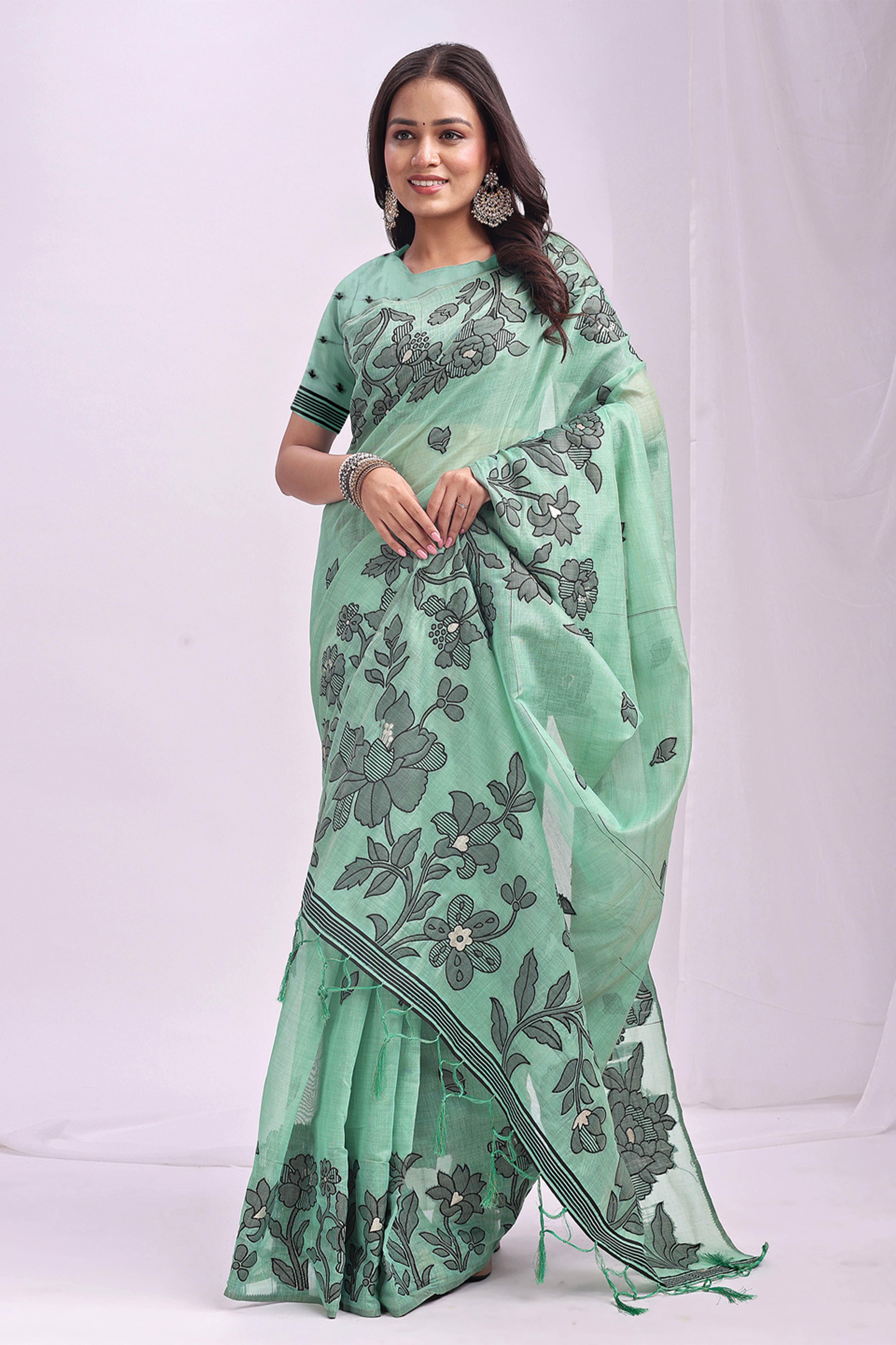 Rama Green Ethnic Saree in a Linen Cotton Blend Adorned with Floral Weave Designs