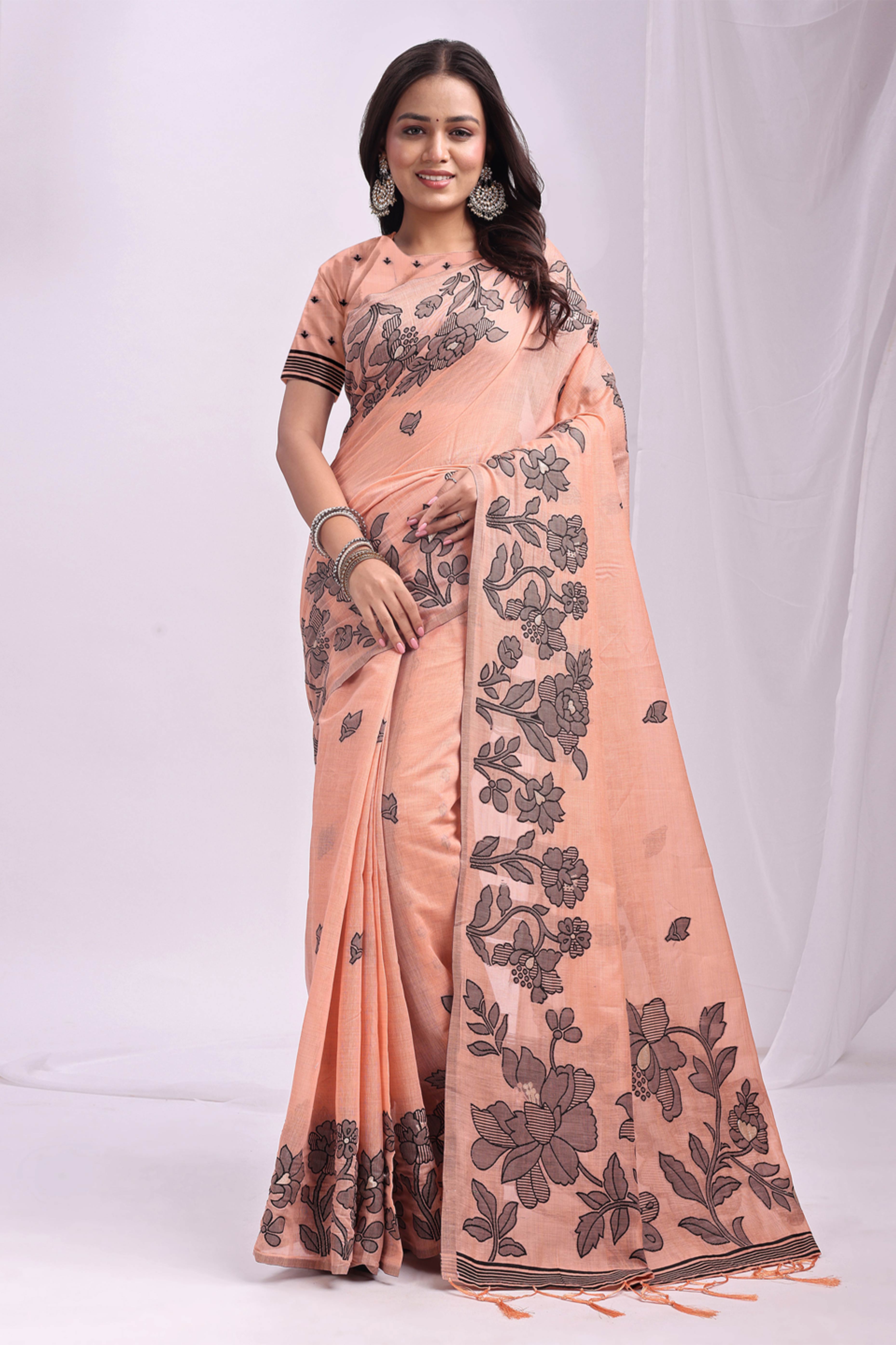 Orange Ethnic Saree in a Linen Cotton Blend Adorned with Floral Weave Designs