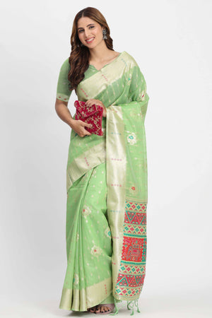 Shimmering Green linen Cotton Saree Embellished With Rich Zari Weaving And Tassels Pallu