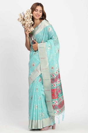 Shimmering Turquoise linen Cotton Saree Embellished With Rich Zari Weaving And Tassels Pallu