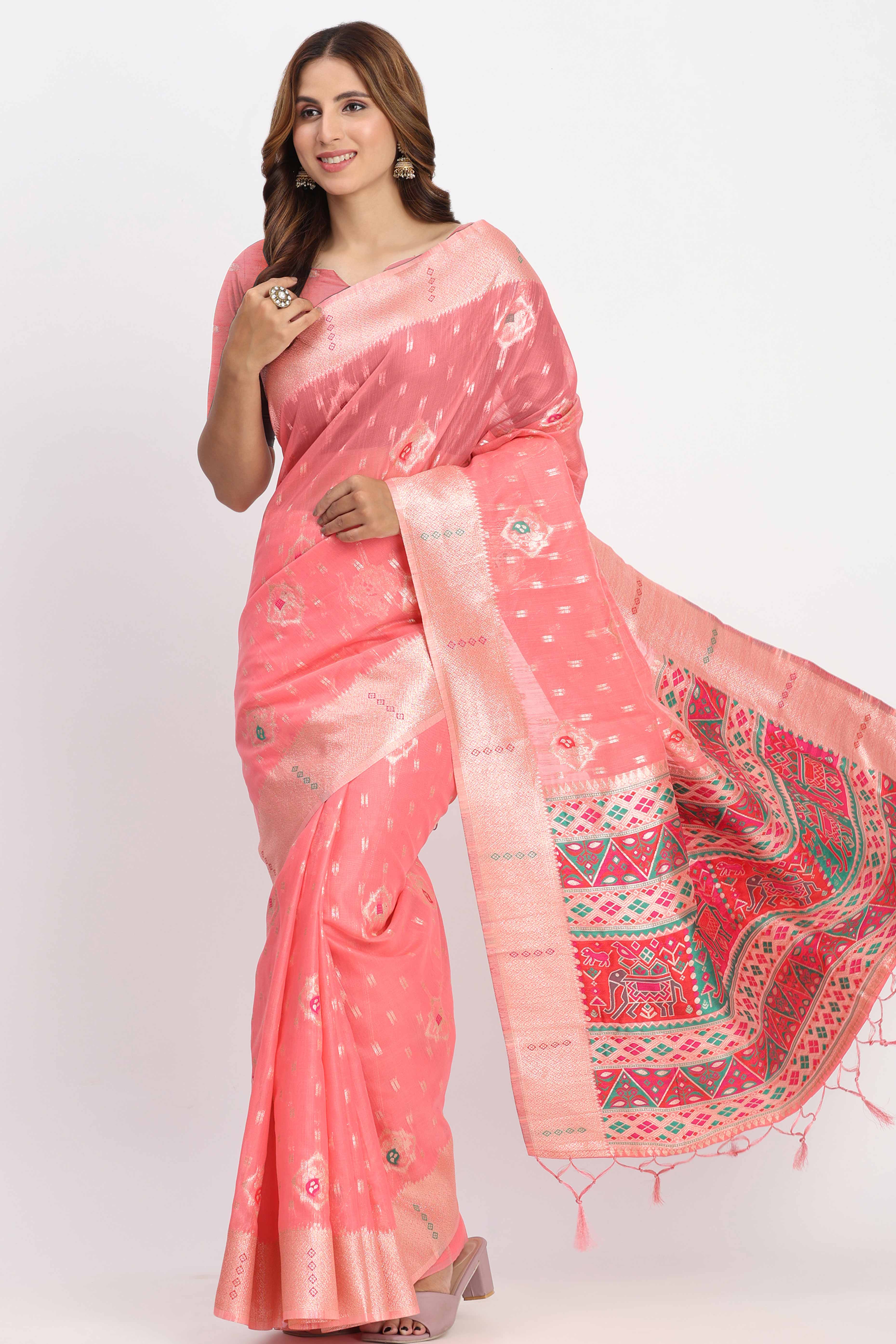 Shimmering Coral Pink  linen Cotton Saree Embellished With Rich Zari Weaving And Tassels Pallu