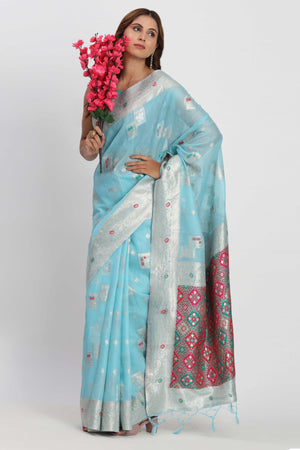 Floral Zari Weaving Brings Regal Beauty To This Sky Blue Linen Cotton Saree With Tassel Accents