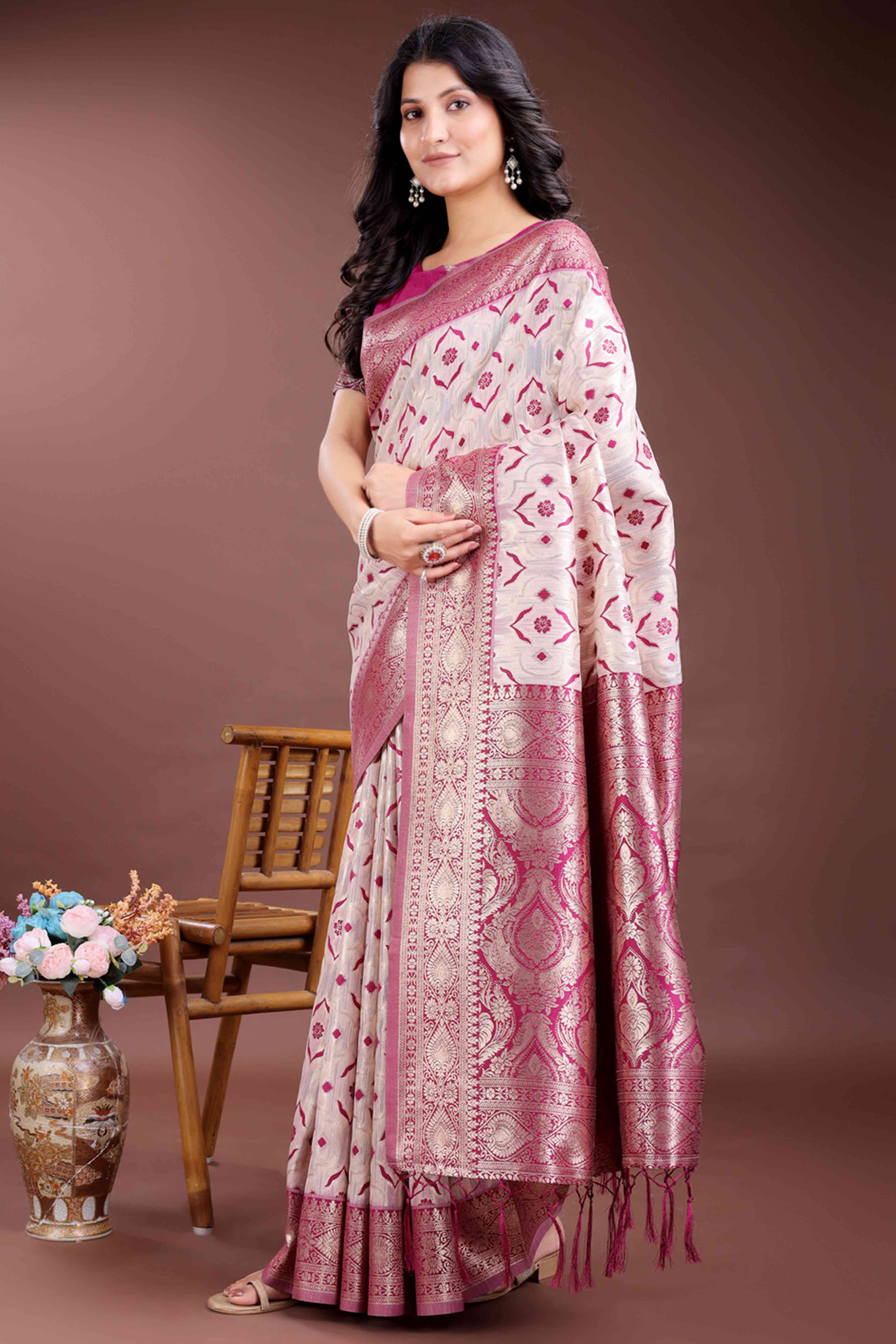 Vibrant Magenta Traditional Ikkat Style Zari Weaving Cotton Blend Saree with Bold Tassel Accents