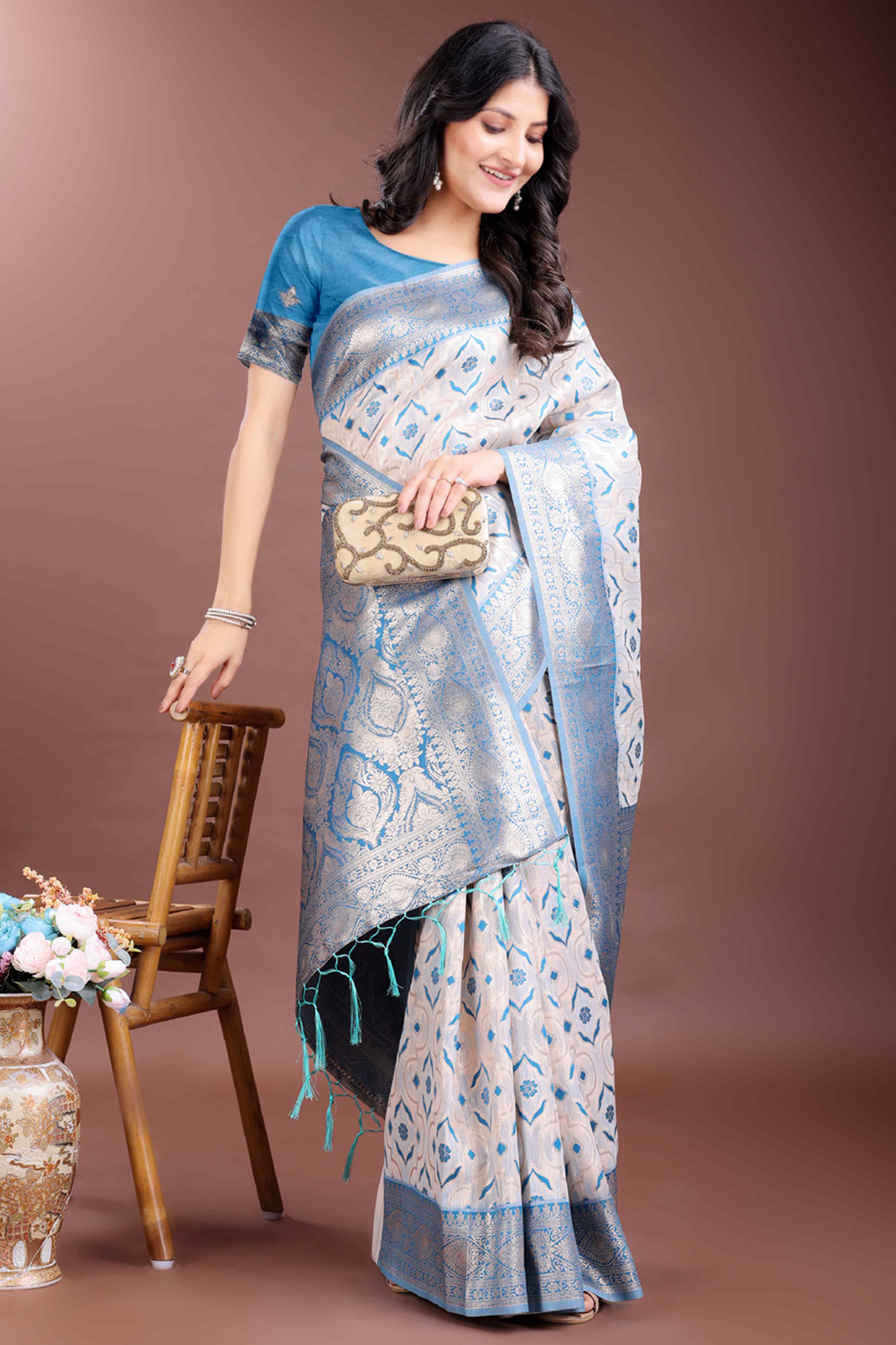 Tranquil Sky Blue Traditional Ikkat Style Zari Weaving Cotton Blend Saree with Charming Tassel Details