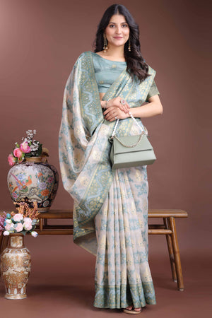 Serene Sea Green Traditional Ikkat Style Zari Weaving Cotton Blend Saree with Artistic Tassel Details