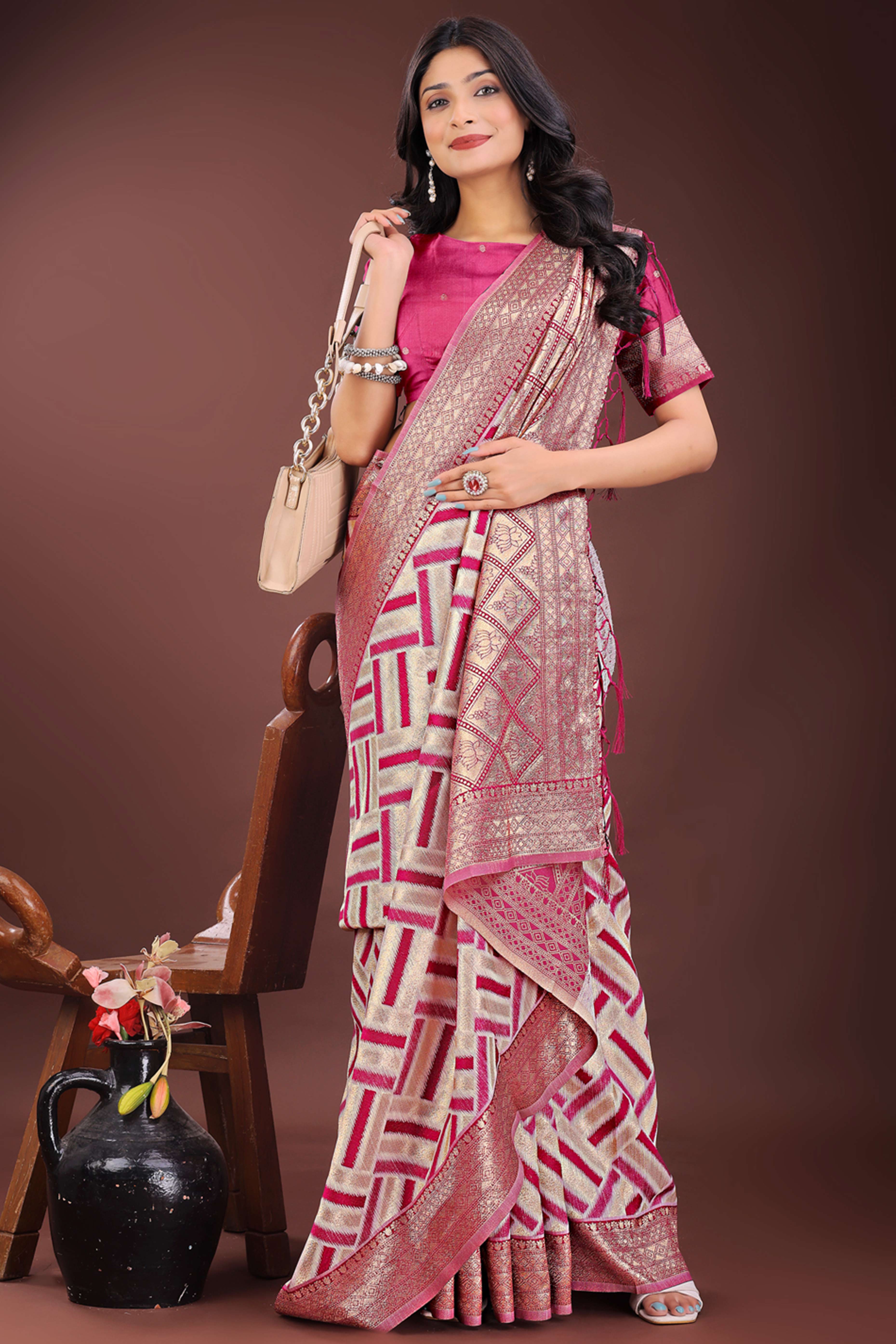 Magenta Saree with Zari Woven Geometric Motifs and Graceful Tassel Accents
