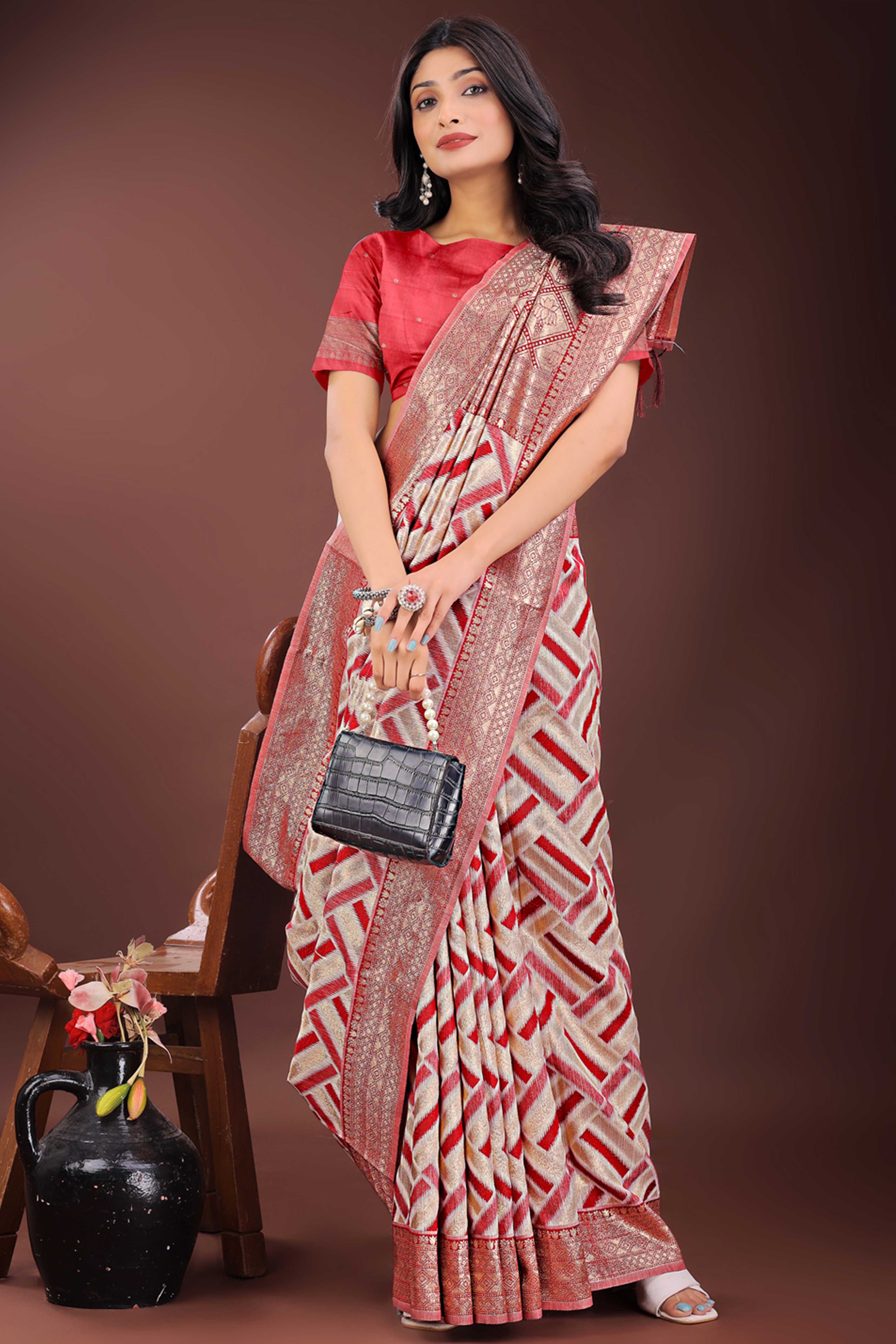 Red Saree with Zari Woven Geometric Motifs and Graceful Tassel Accents