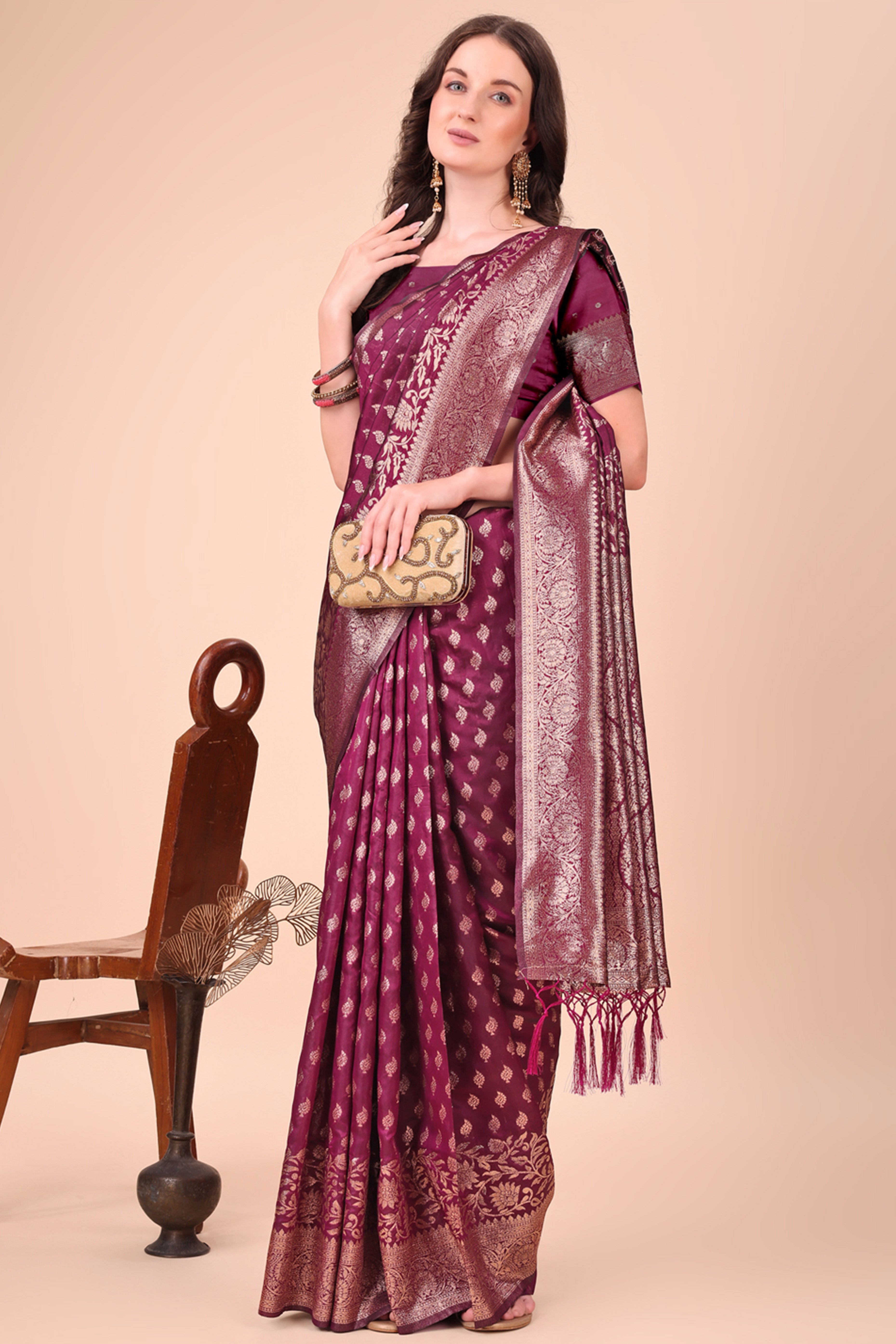 Wine Saree In Lichi Silk Blend With Floral Zari Weaving & Delicate Tassel Border