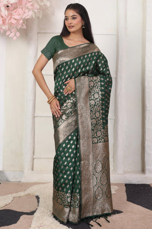 Green Traditional Lichi Silk Blend Saree Enhanced With Floral Zari Weaving & Tassel Pallu