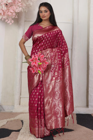 Pink Traditional Lichi Silk Blend Saree Enhanced With Floral Zari Weaving & Tassel Pallu