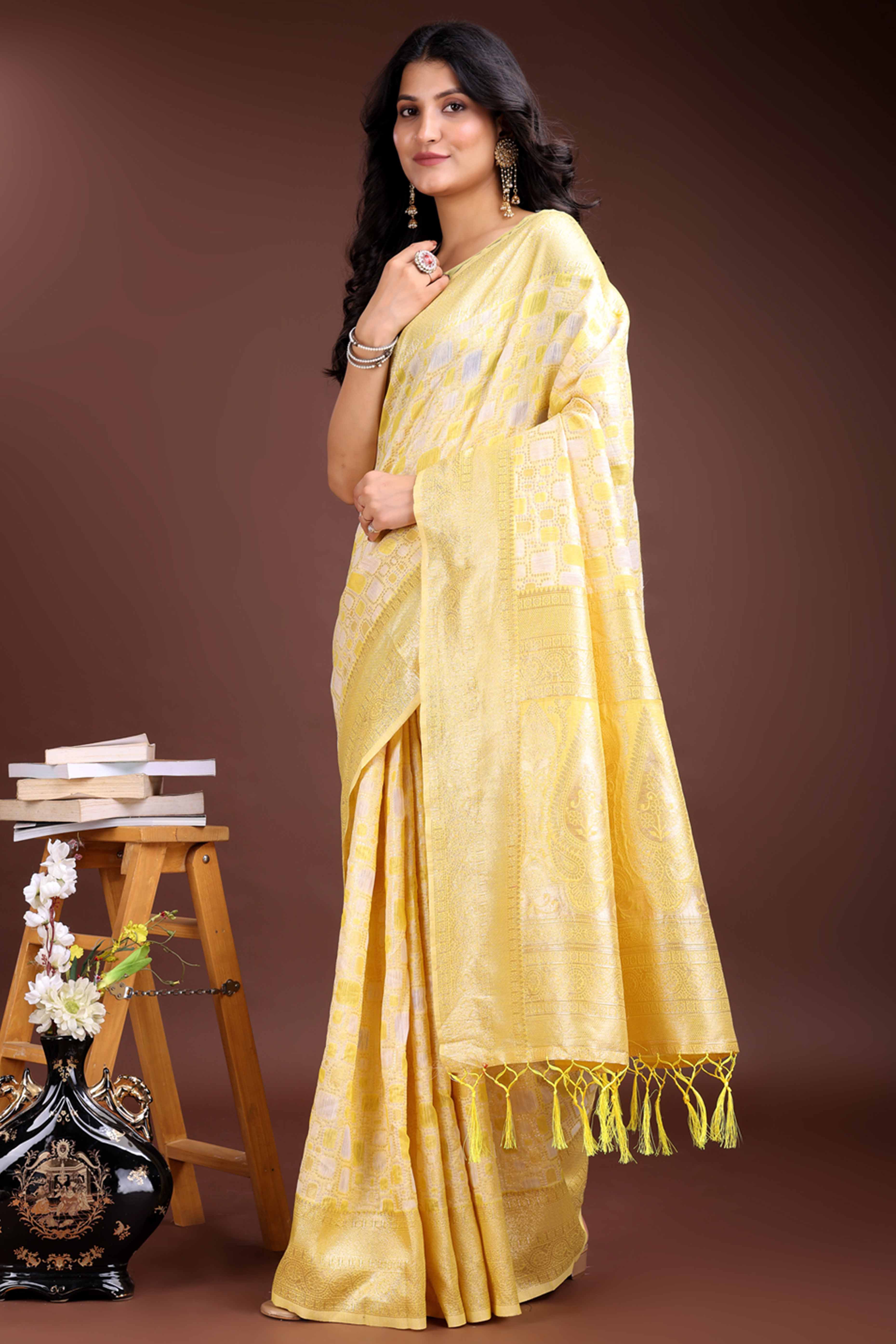 Radiant Yellow Geometric Style Zari Weaving Cotton Blend Saree Accented with Vibrant Tassels