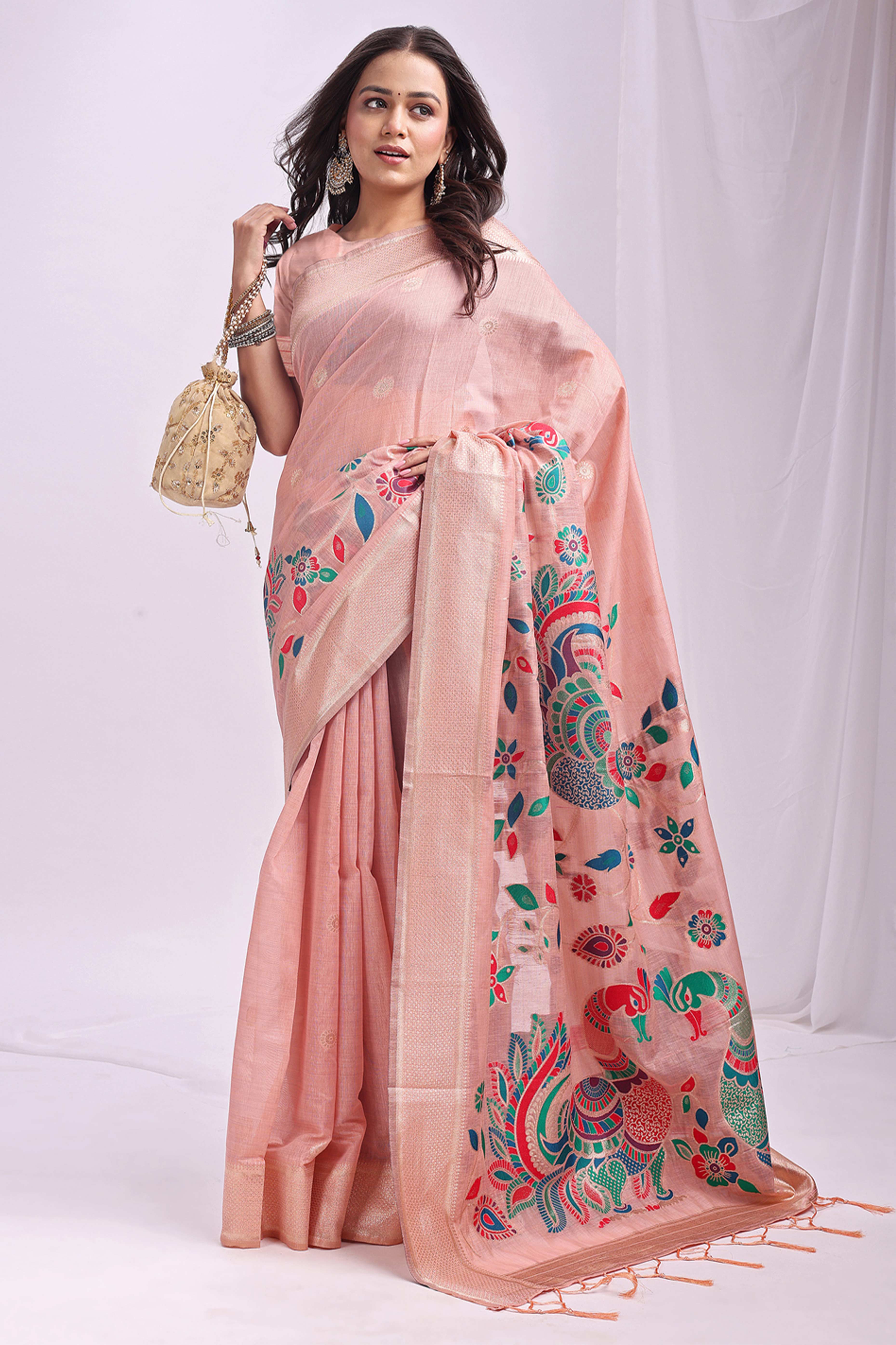 Peach Floral Woven Linen Cotton Saree Accented With Peacock Motif Pallu & Zari Border