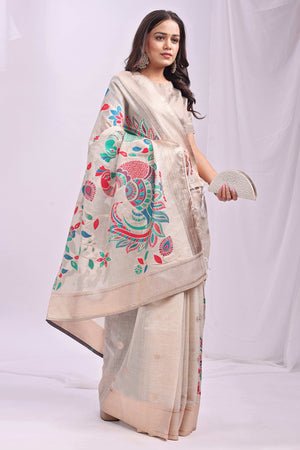Cream Floral Woven Linen Cotton Saree Accented With Peacock Motif Pallu & Zari Border