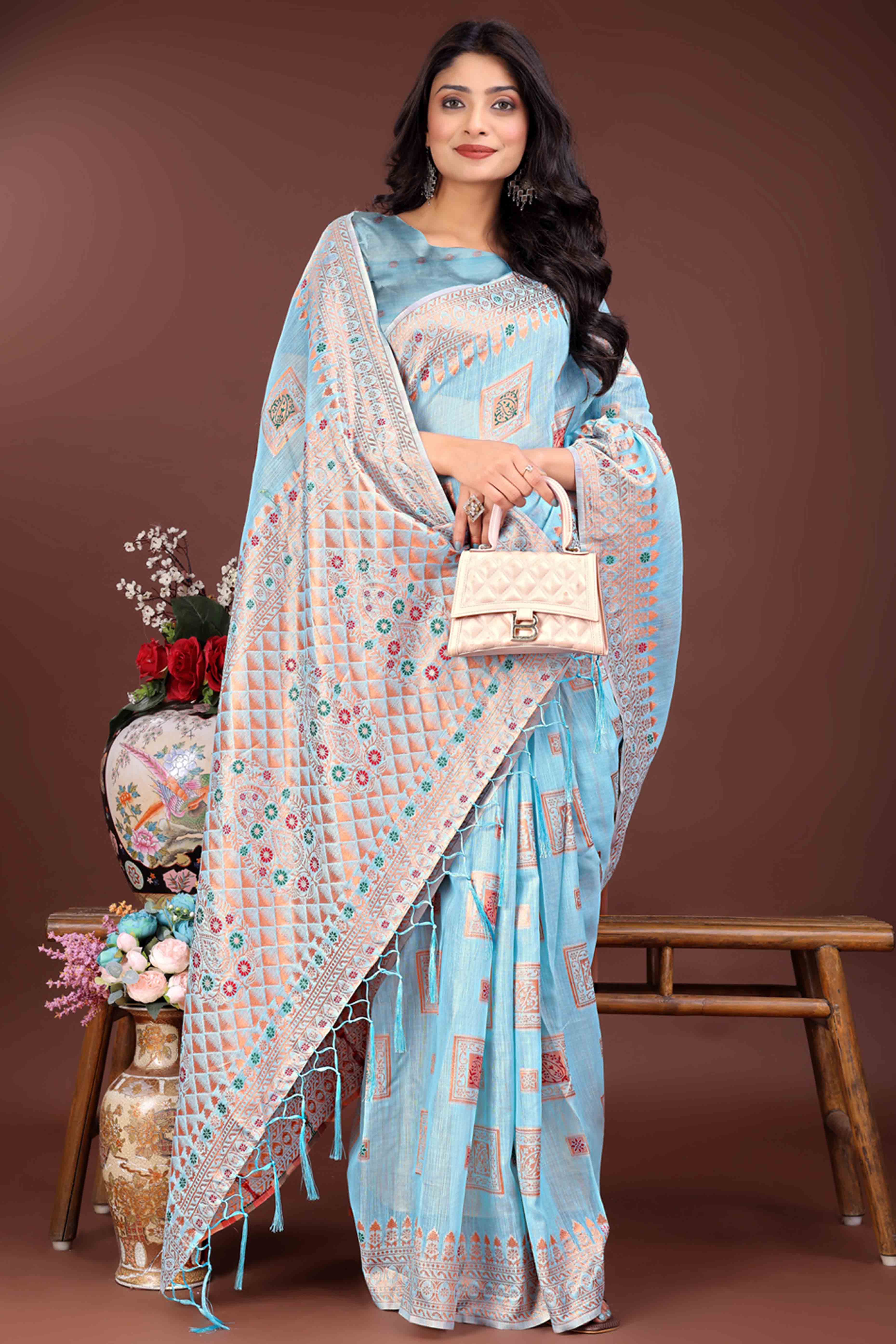 Elegant Floral Zari Weaving Embellished Sky Blue Saree In Linen Cotton with Tassel Accents
