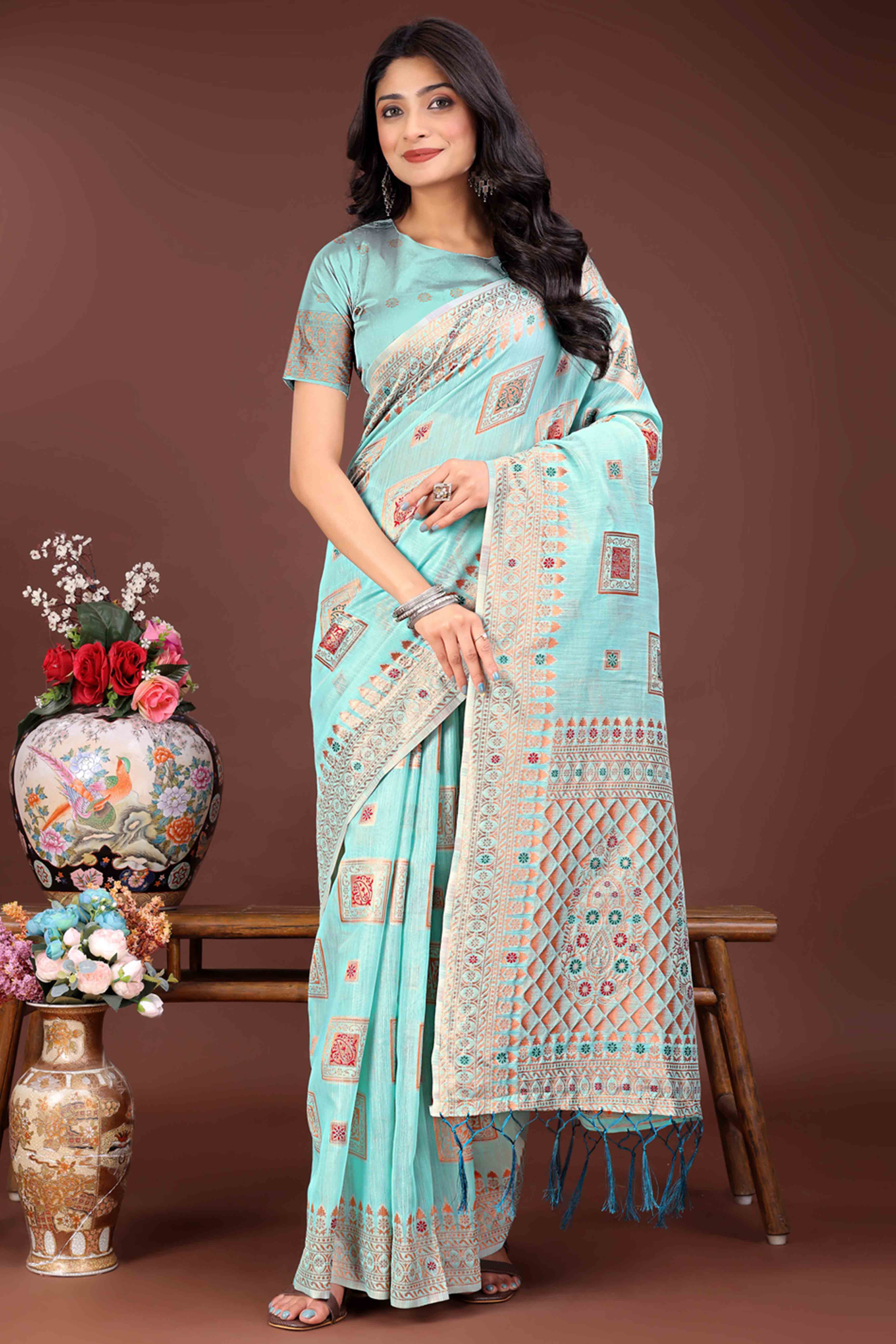 Majestic Floral Zari Weaving Embellished Pale Blue Saree In Linen Cotton with Tassel Accents