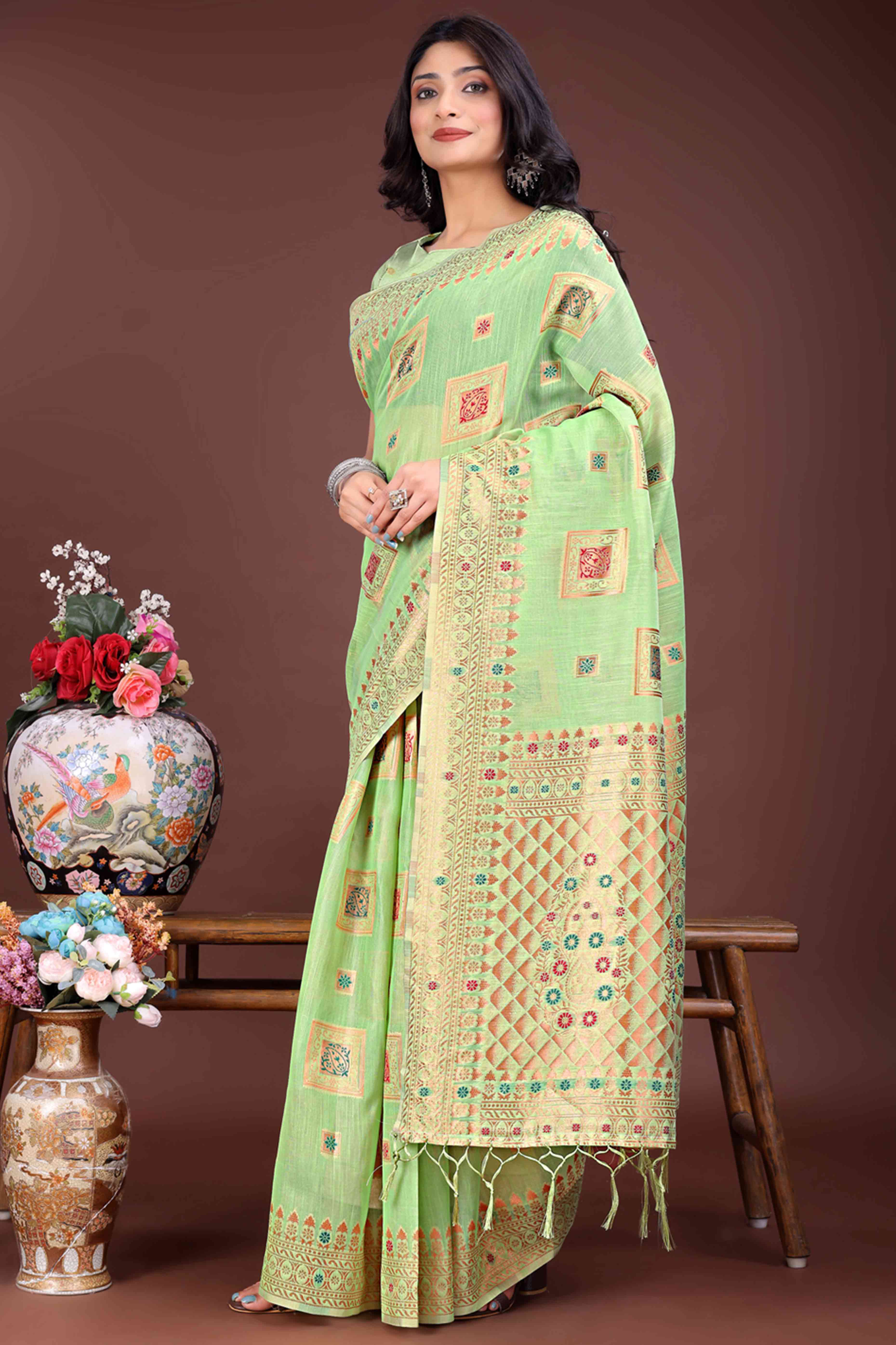 Sophisticated Floral Zari Weaving Embellished Green Saree In Linen Cotton with Tassel Accents