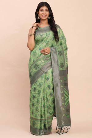 Green Patola Inspired Linen Cotton Saree Adorned With Zari Weaving & Graceful Tassel Pallu