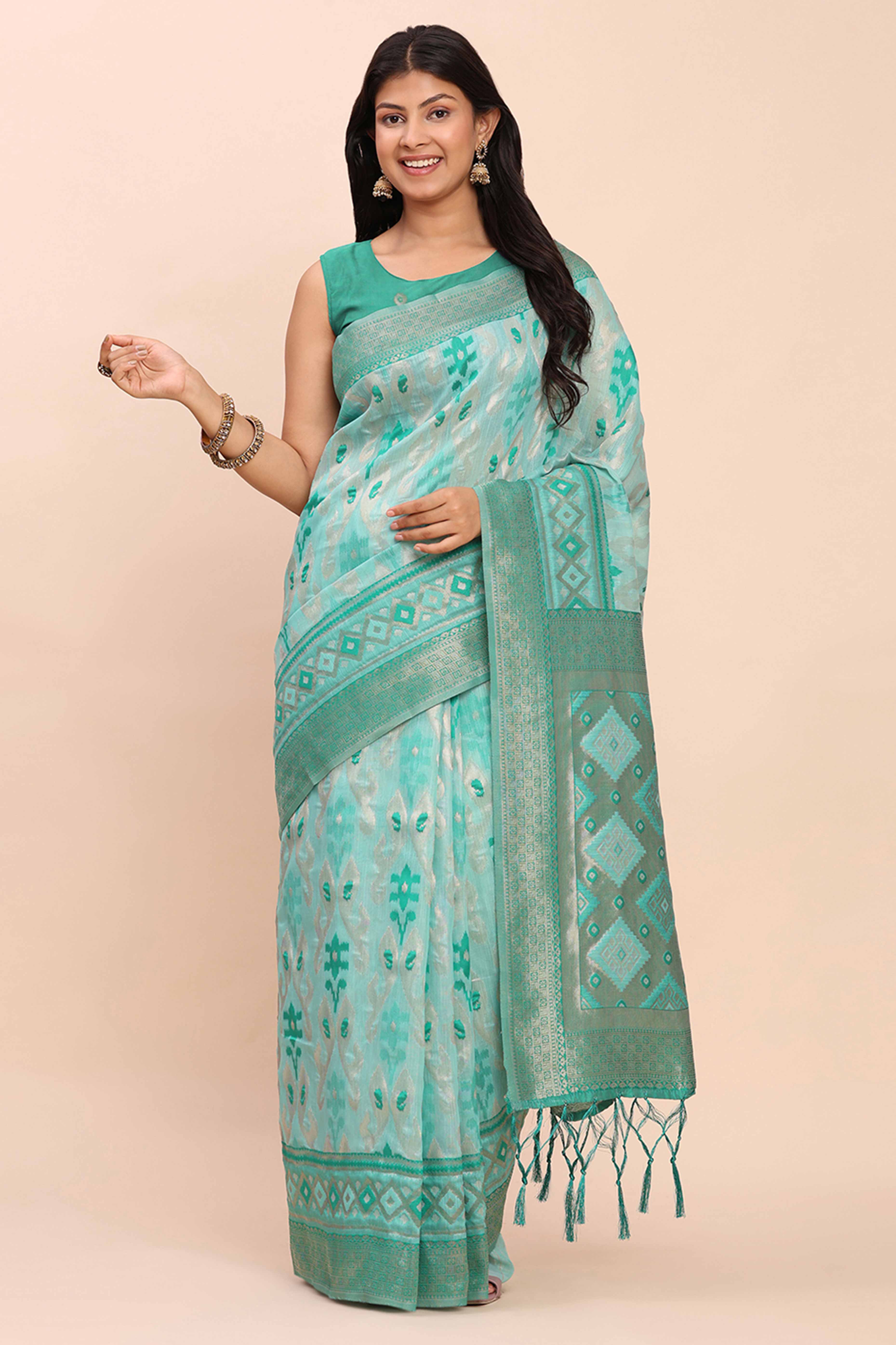 Turquoise Patola Inspired Linen Cotton Saree Adorned With Zari Weaving & Graceful Tassel Pallu