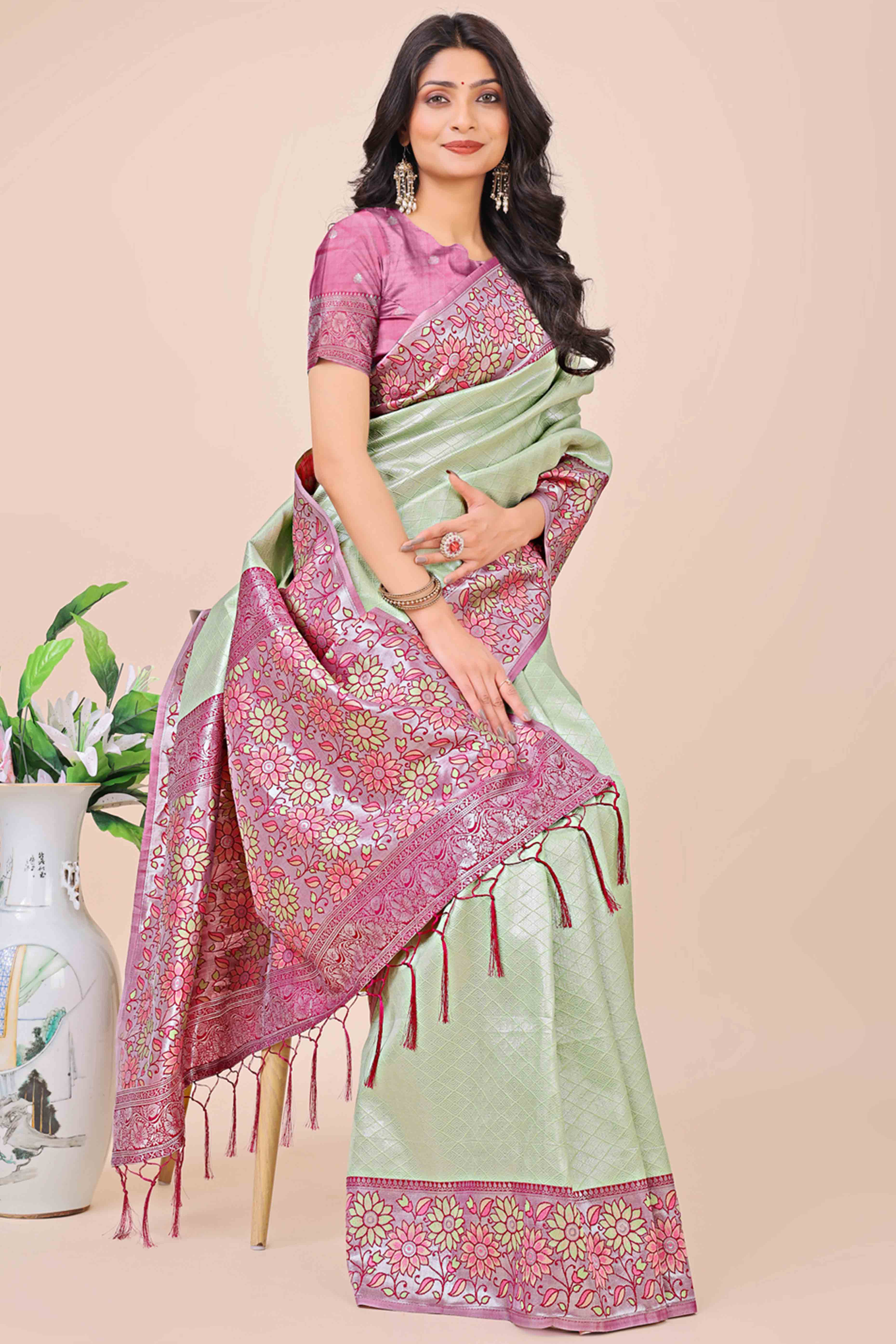Green Lichi Silk Blend Saree With Exquisite Floral Weaving & Graceful Tassel Details