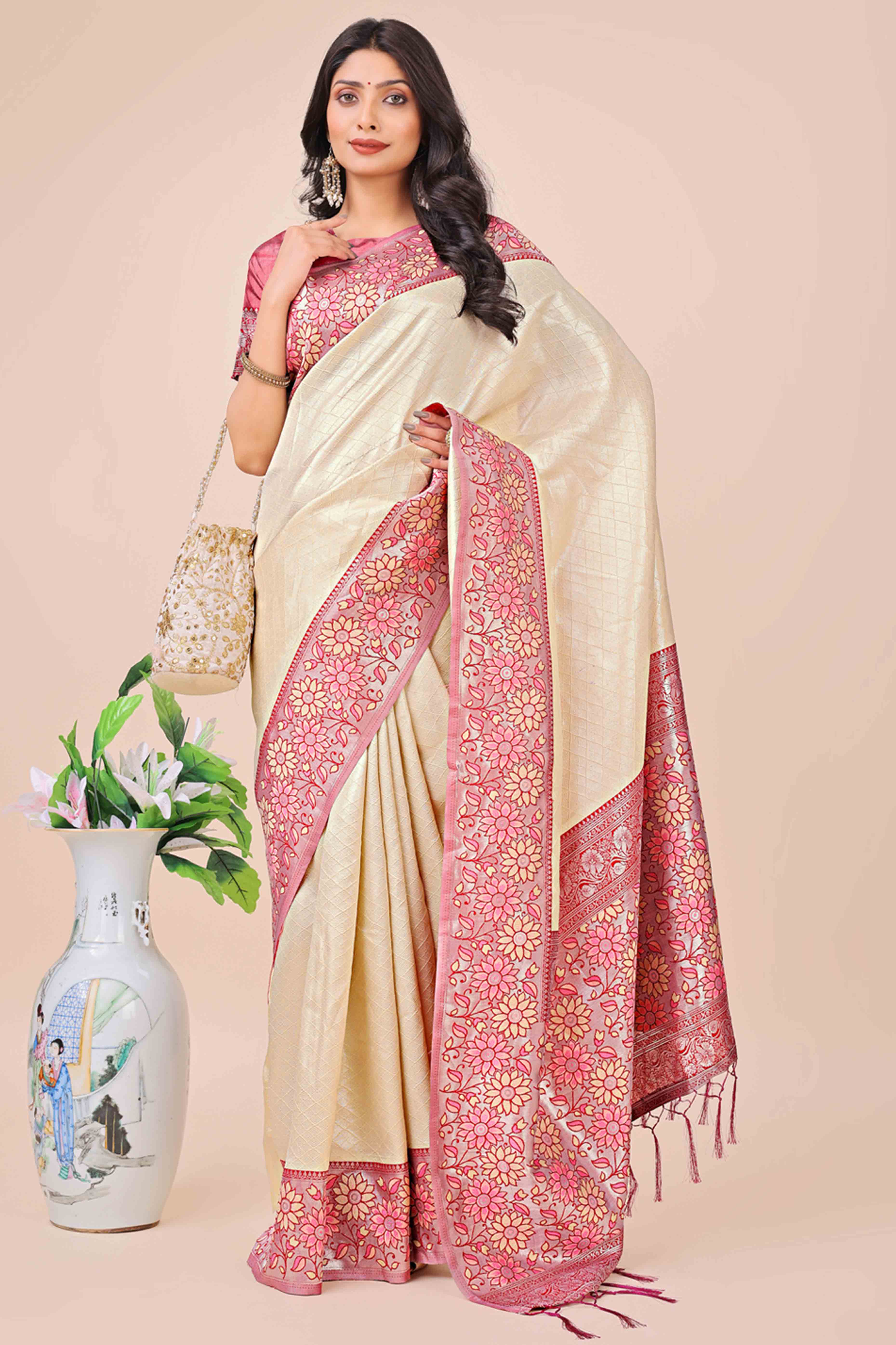 Cream Lichi Silk Blend Saree With Exquisite Floral Weaving & Graceful Tassel Details