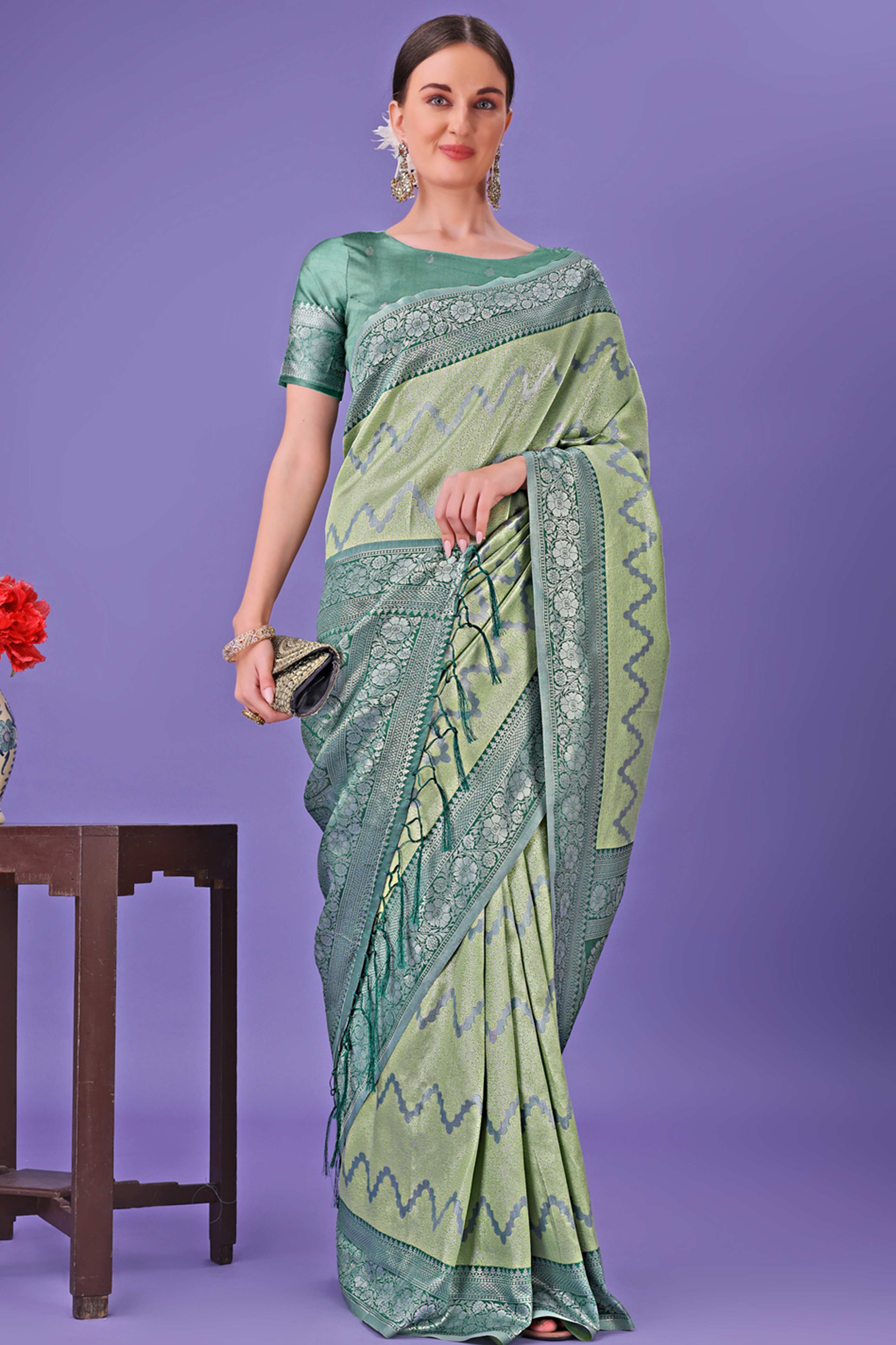 Light Green Lichi Cotton Silk Saree Adorned With Floral Zari Weave & Tassels