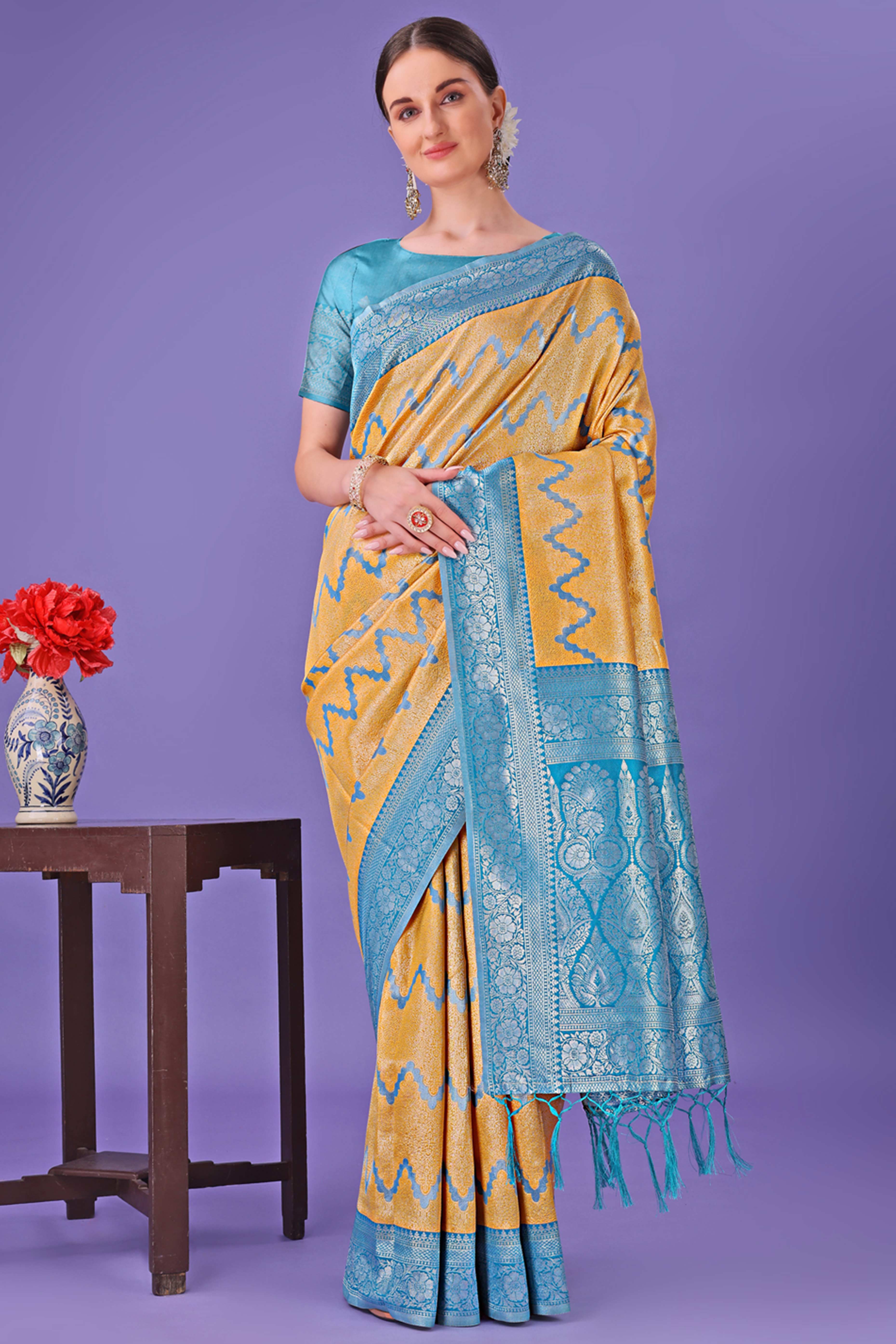 Yellow Lichi Cotton Silk Saree Adorned With Floral Zari Weave & Tassels