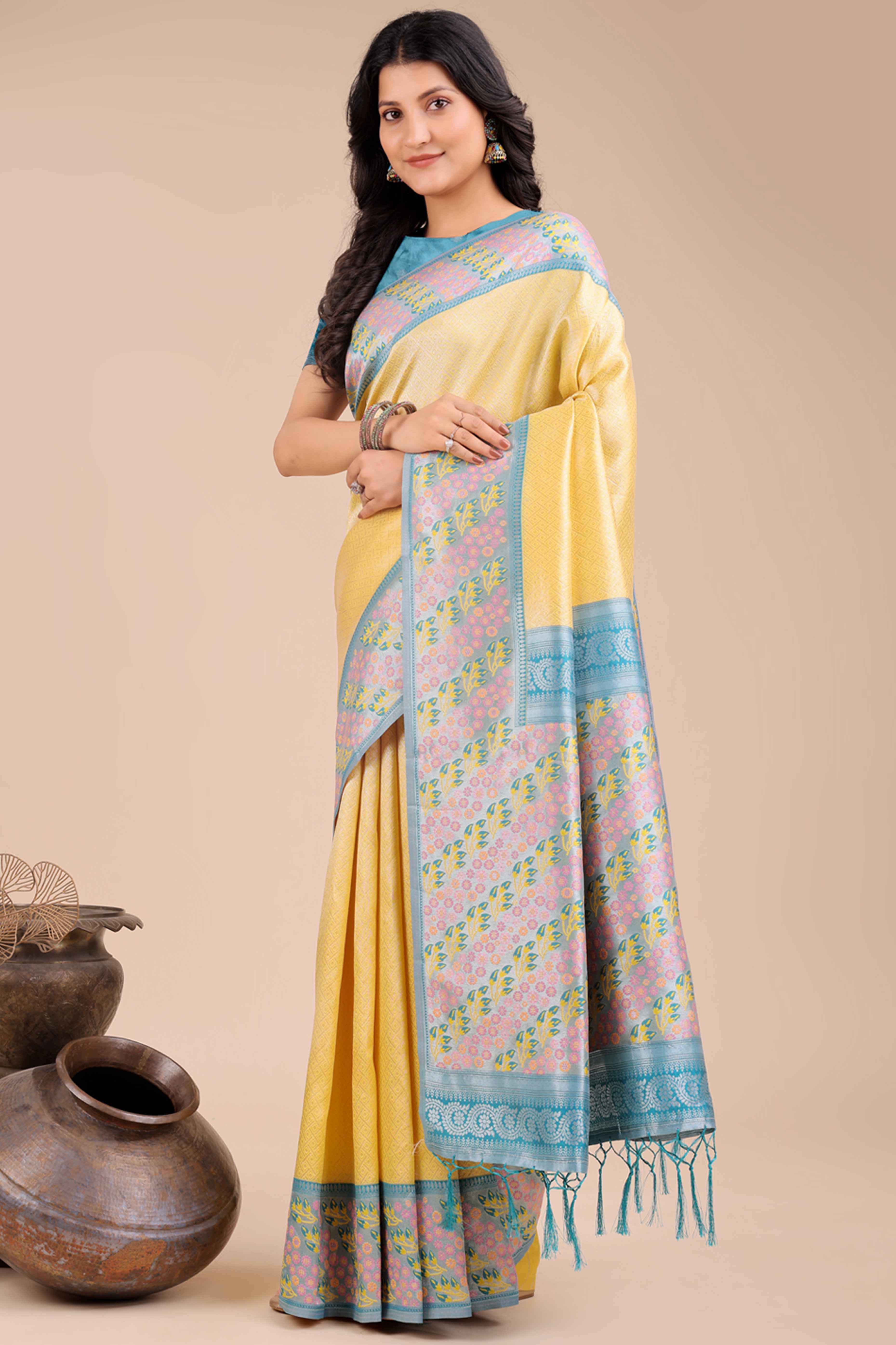 Yellow Silk Blend Saree Embellished With Zari Weaving & Tassel Accents