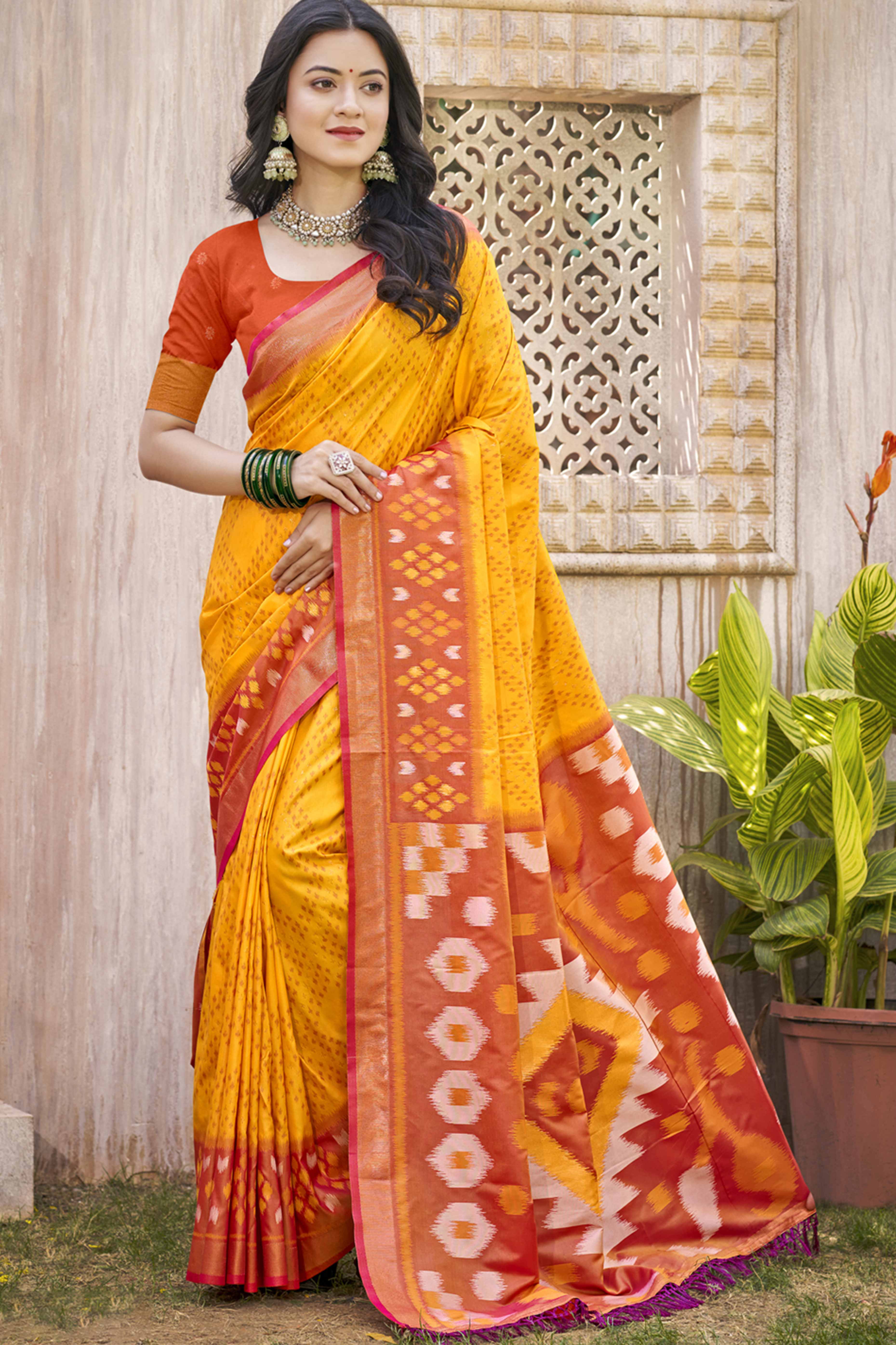 Yellow Ikkat Woven Silk Saree for Festive Celebrations
