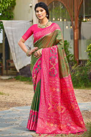 Graceful Mehendi Green Pochampally Silk Blend Saree Adorned With Floral Weaving & Tassel Pallu