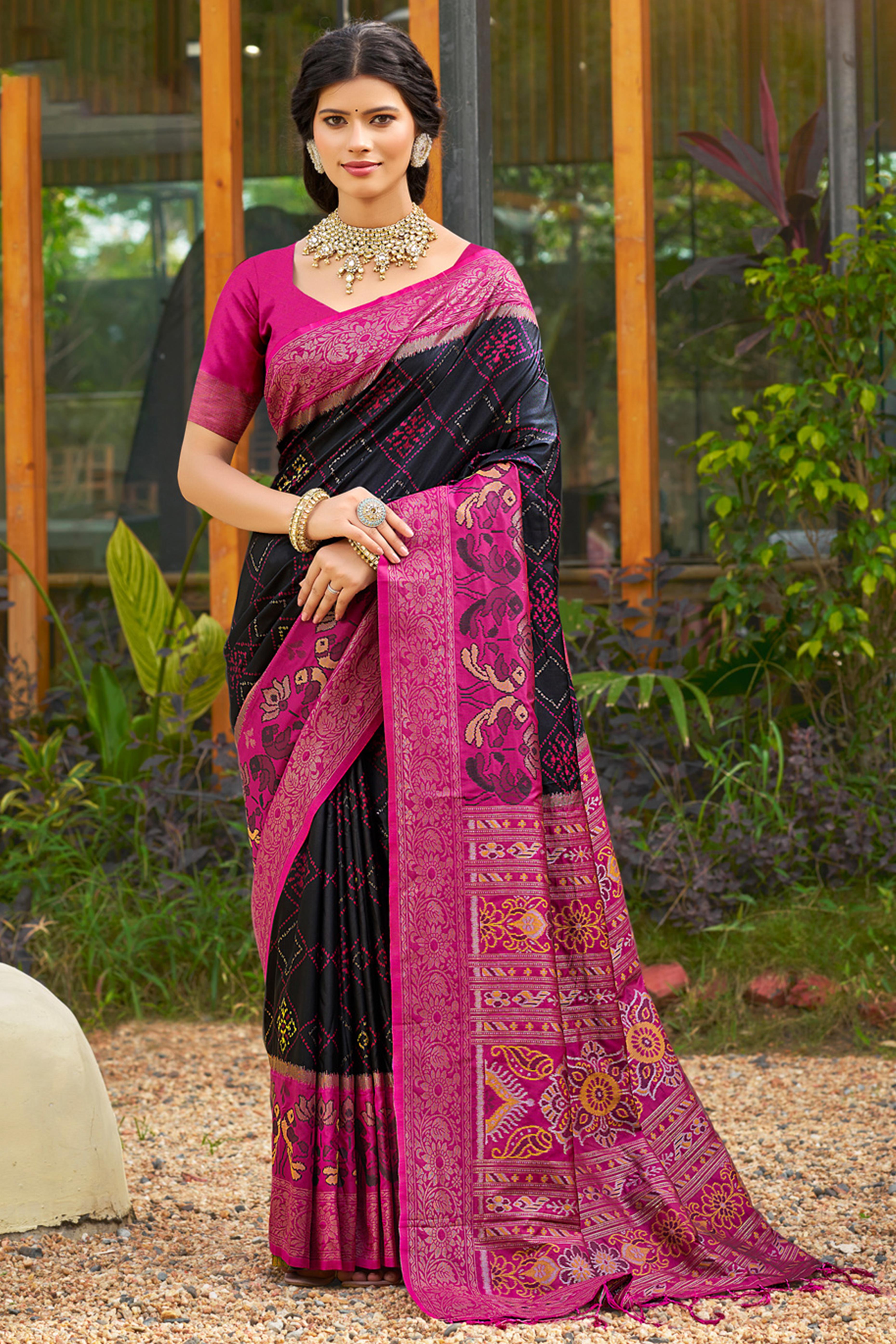 Graceful Black Pochampally Silk Blend Saree Adorned With Floral Weaving & Stylish Tassel Pallu