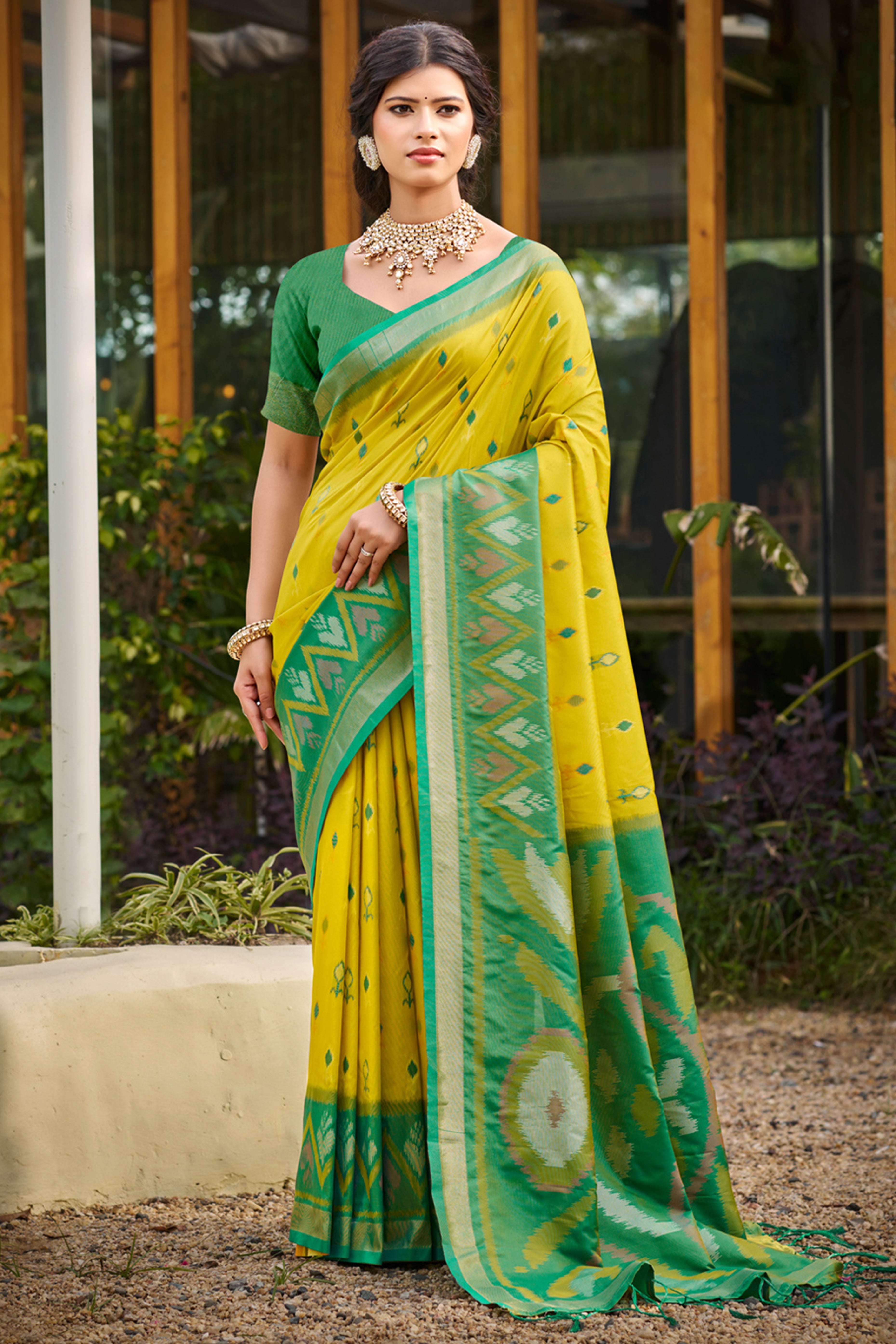 Elegant Lemon Yellow Pochampally Ikkat Silk Blend Saree Featuring Intricate Weaving & Tassel Pallu