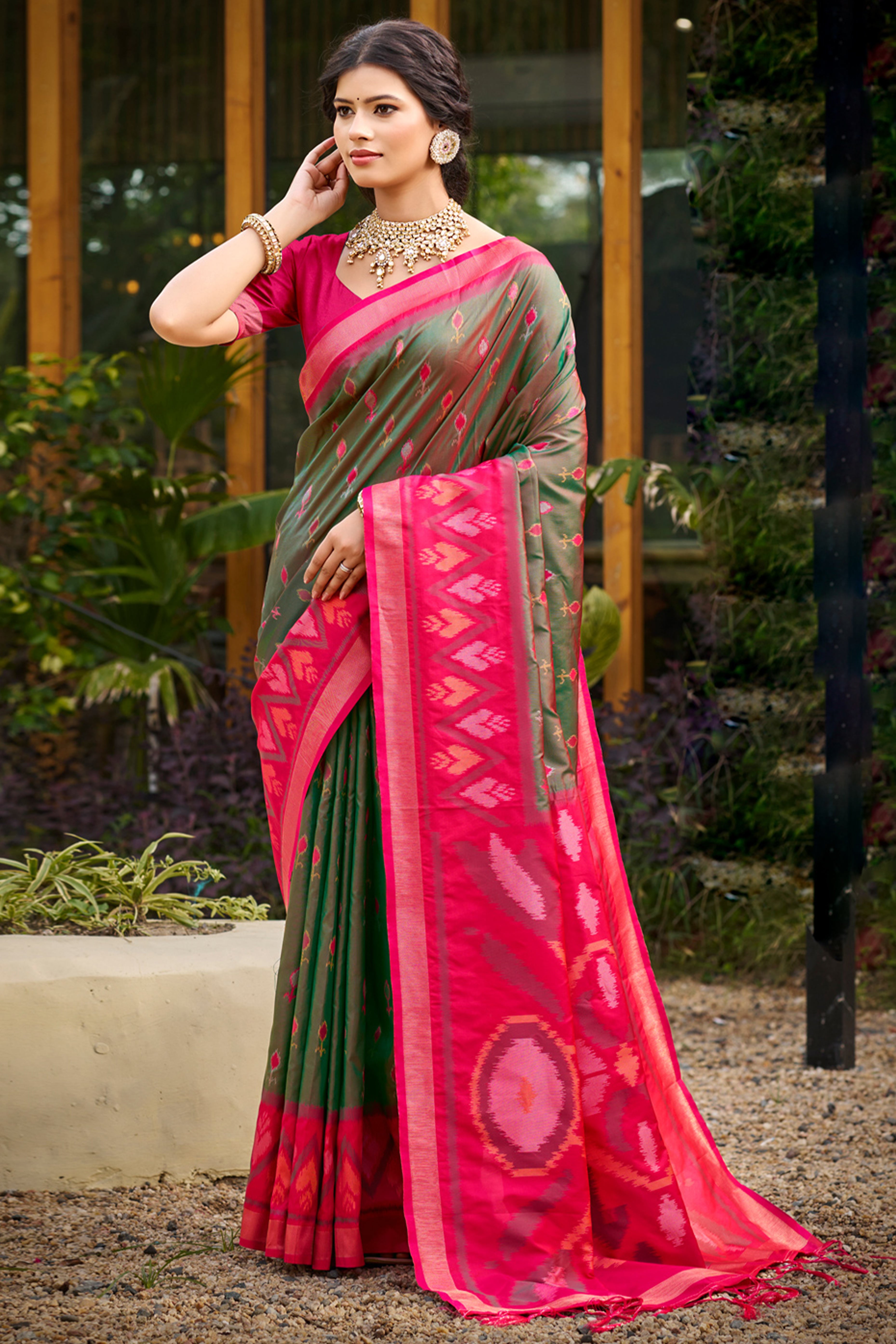Elegant Mehendig Green Pochampally Ikkat Silk Blend Saree Featuring Intricate Weaving & Tassel Pallu