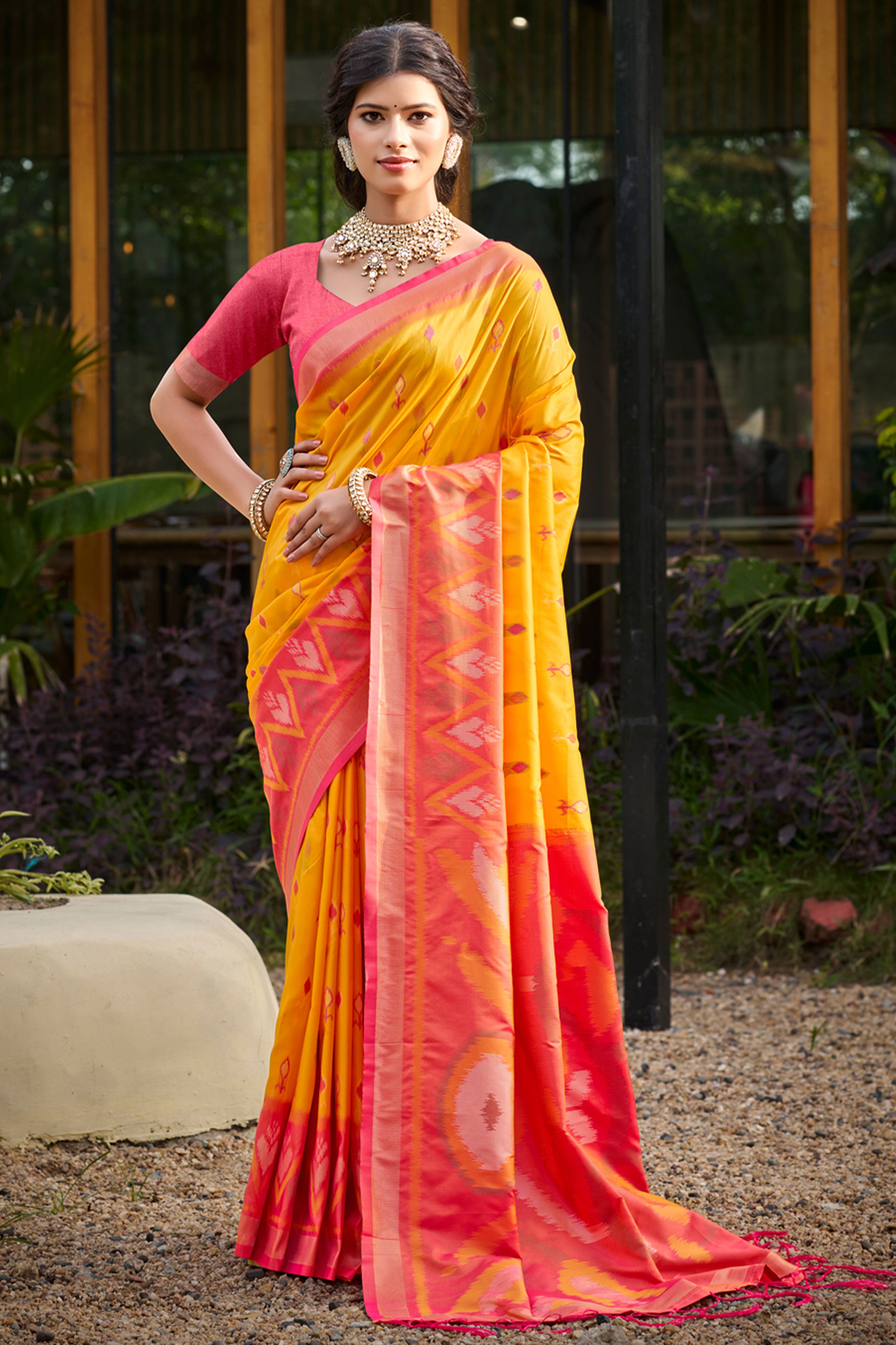 Elegant Yellow Pochampally Ikkat Silk Blend Saree Featuring Intricate Weaving & Tassel Pallu